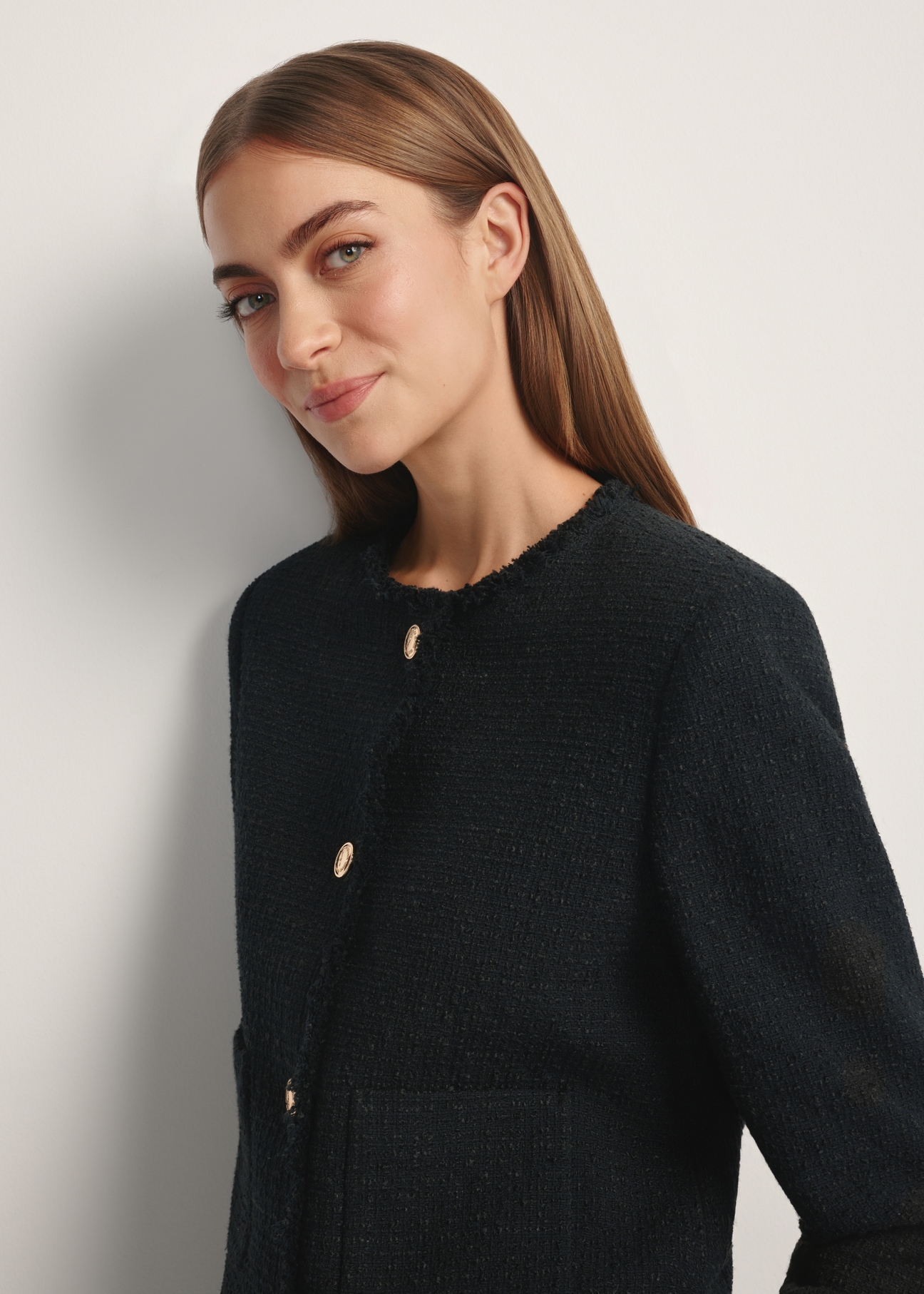 Black short women's jacket ZAKDT-0041-99(W26), close-up of the product from the front on the model's silhouette.