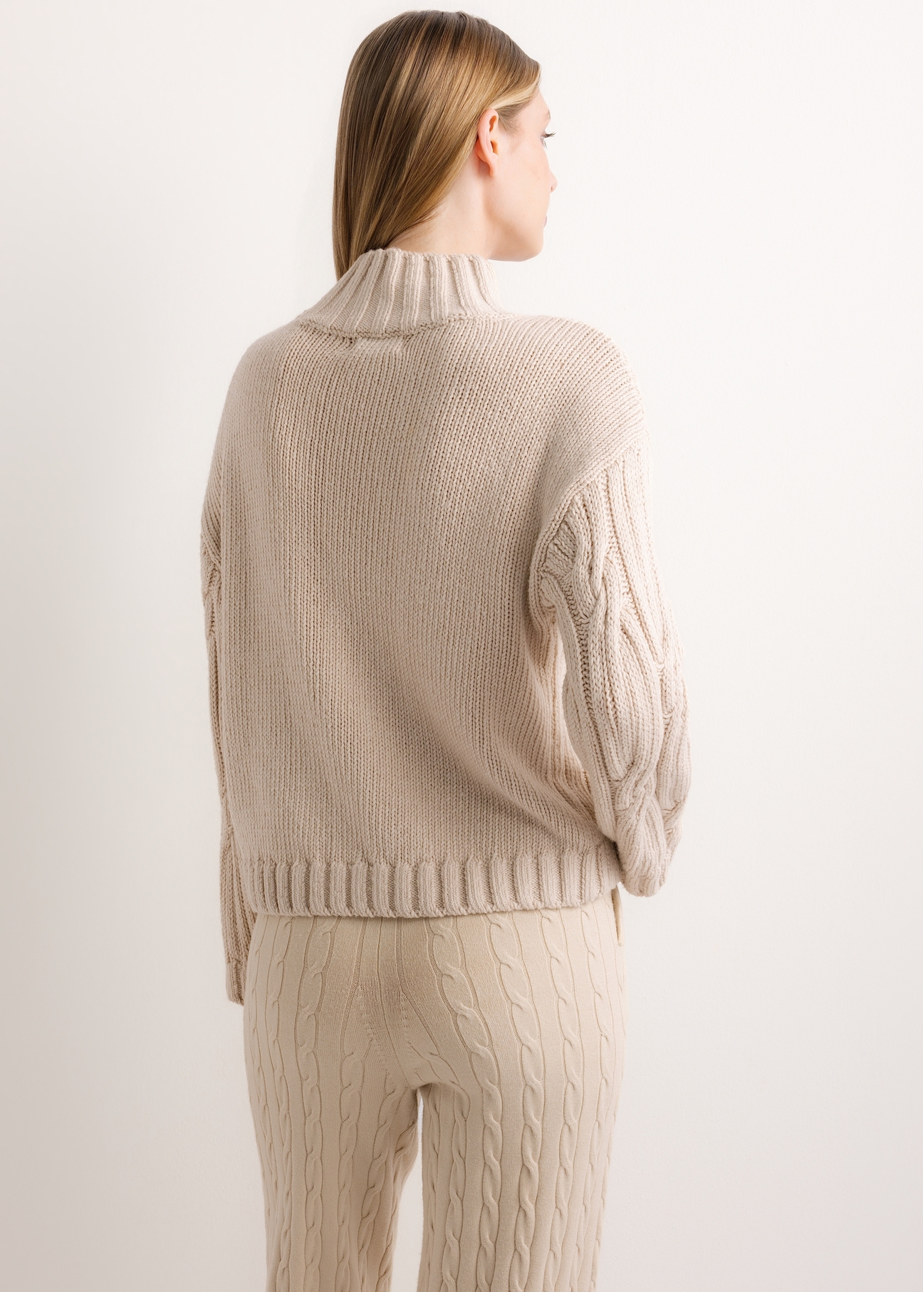 Women's oversized sweater in light beige SWEDT-0278-1A(Z26), product view from the back on the model. Half of the silhouette visible.