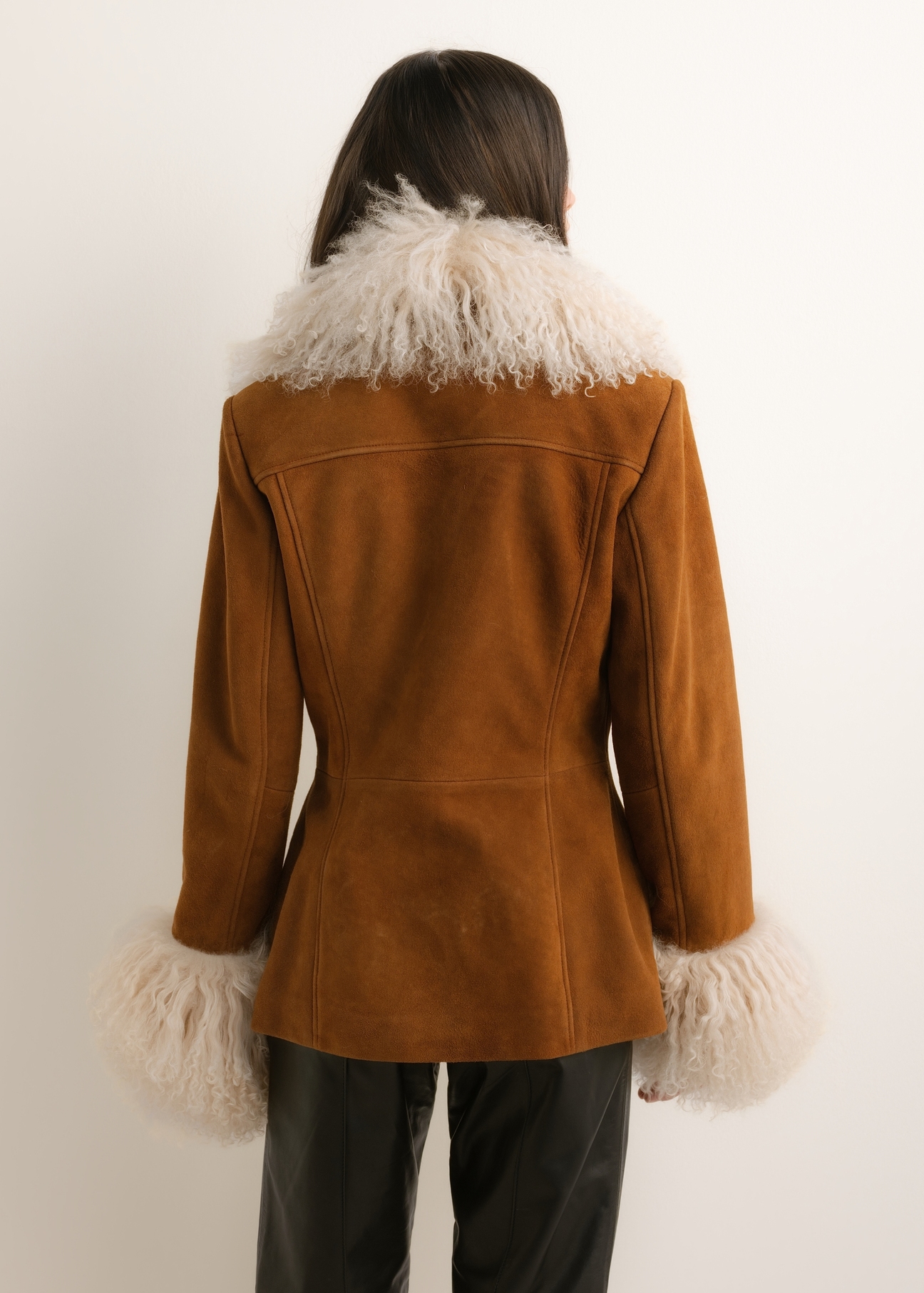 Women's cognac leather jacket (model KURDS-0633-1F(Z26)), rear view on a model. Half-body shot.