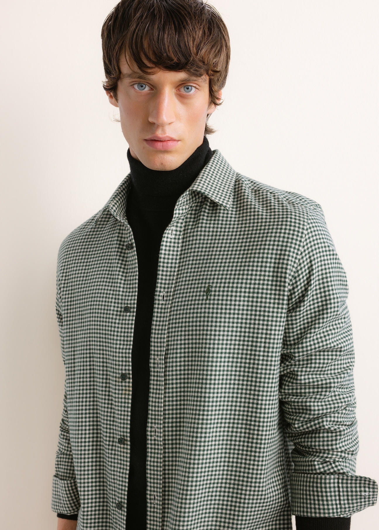 Dark green men's shirt with a fine check pattern KOSMT-0372-8C(Z26); close-up of the product worn by a model, against a light background.
