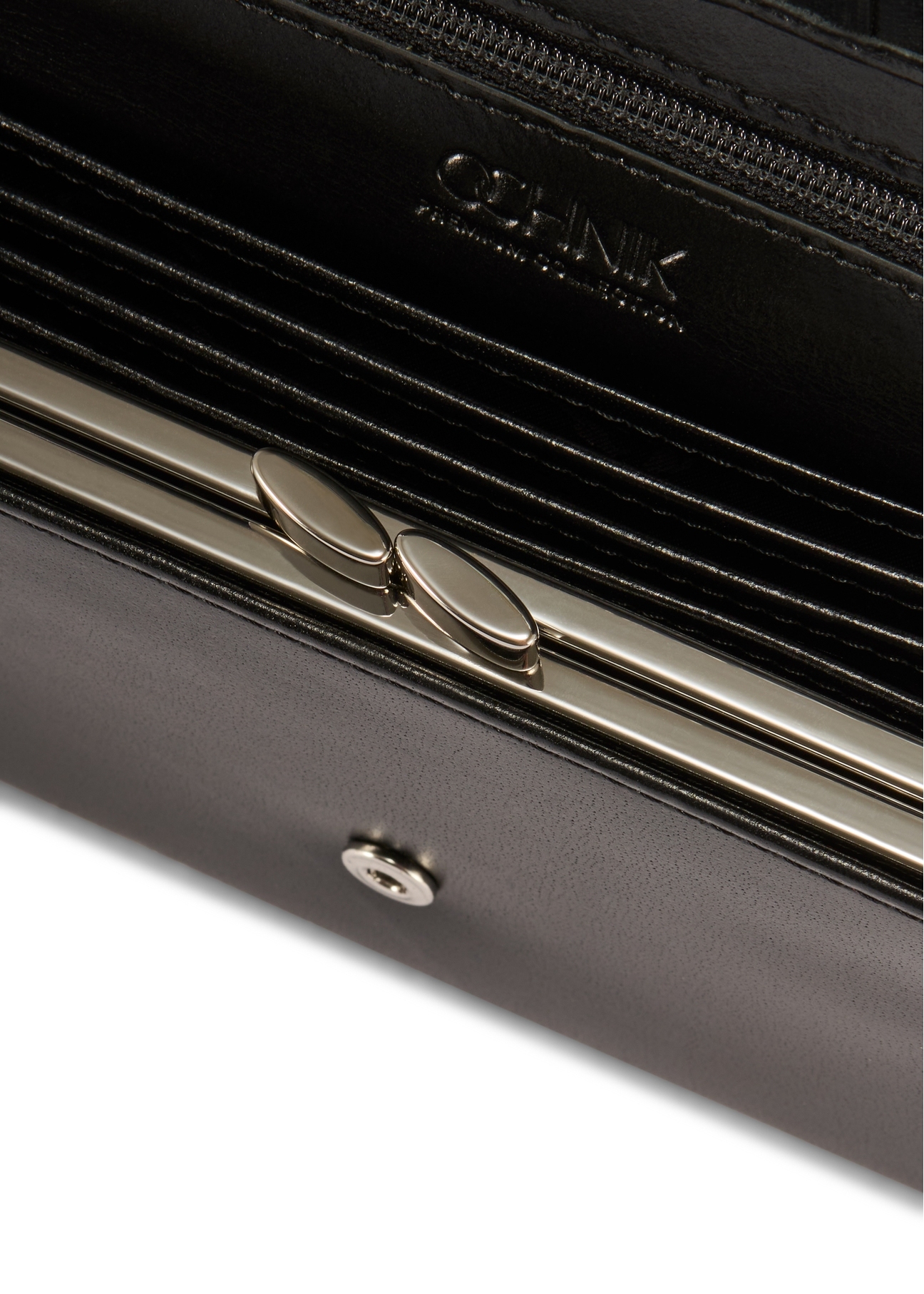 Black large leather women's wallet PORES-0974-99(Z25), close-up of product detail, view on white background.