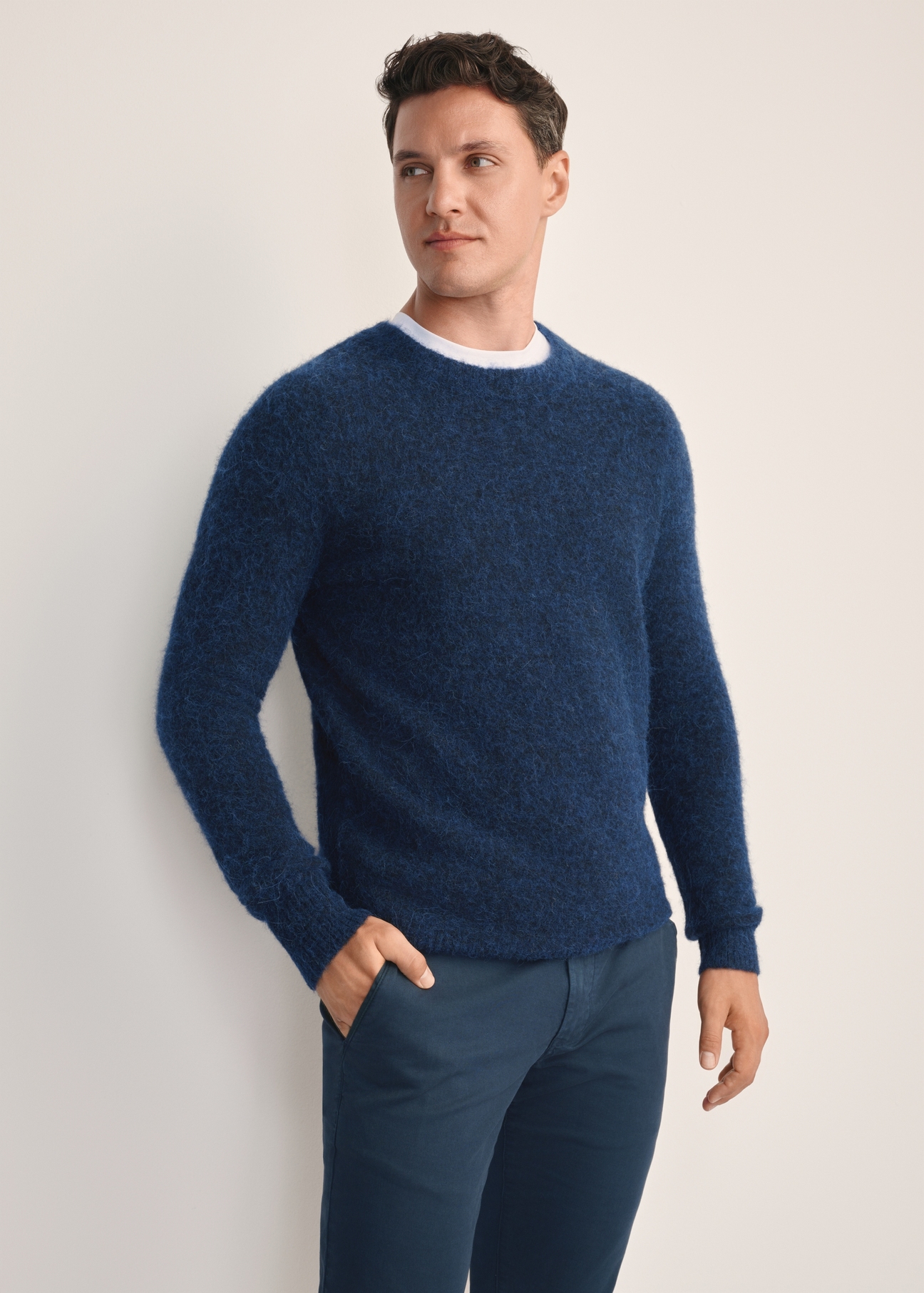 Men's navy wool sweater SWEMT-0171-68(Z25), front product view on model. Half silhouette visible.