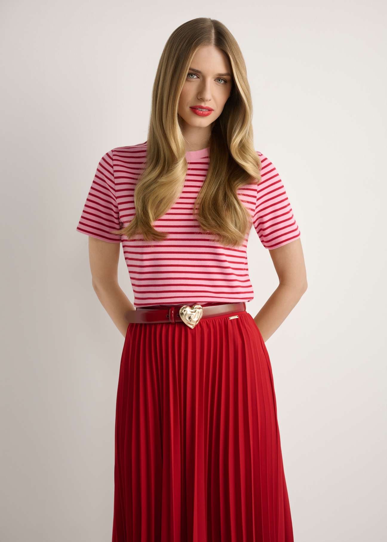 Women's Pink Striped T-shirt TSHDT-0150-5P(W26), front view of the product on the model. Half of the silhouette visible.