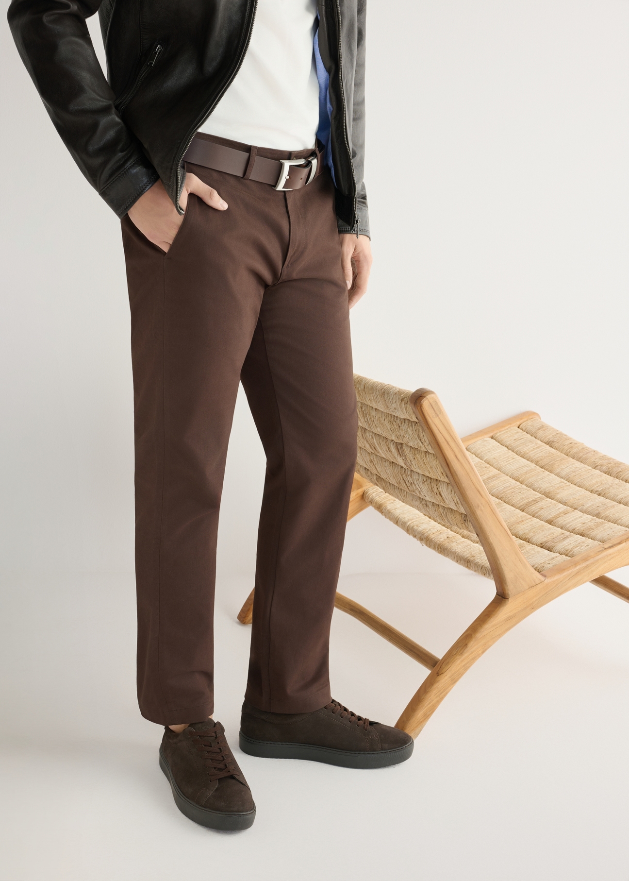 Dark brown leather sports shoes BUTYM-0503A-1I(W26), side view of the product on the model's feet.