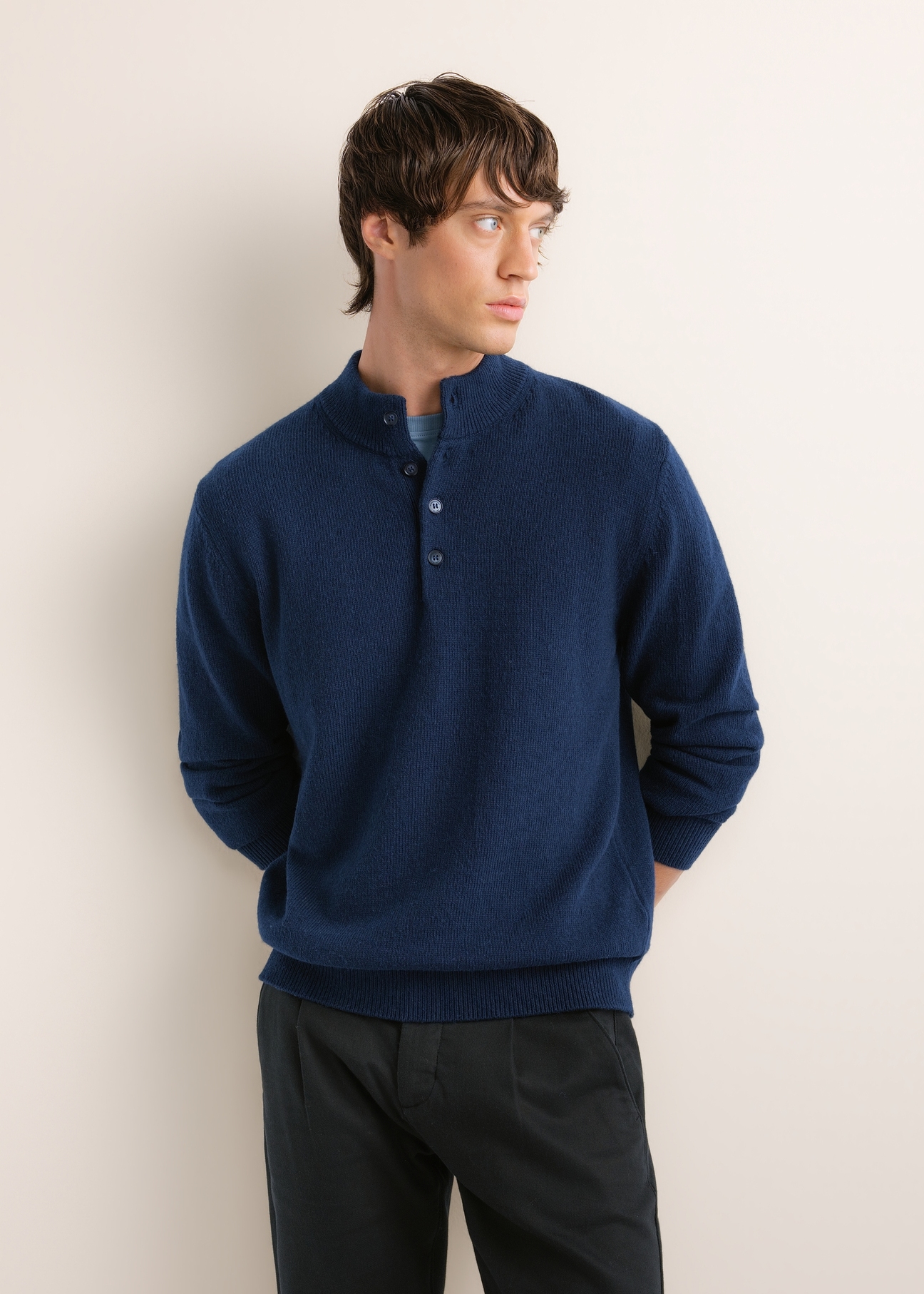 Men's dark navy blue sweater with a wool blend (SWEMT-0215-7E(Z26)); front view of the product on a model. Half of the figure is visible.