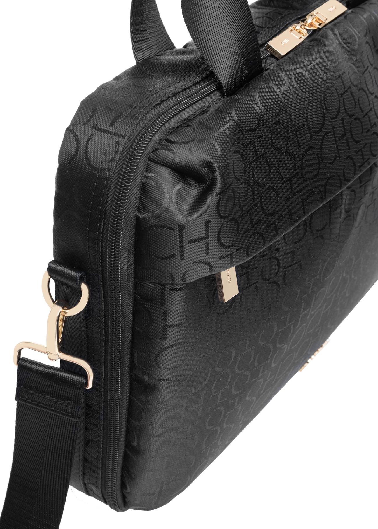 Black women's bag with monogram TOREN-0299-99(W25), close-up of detail on white background.