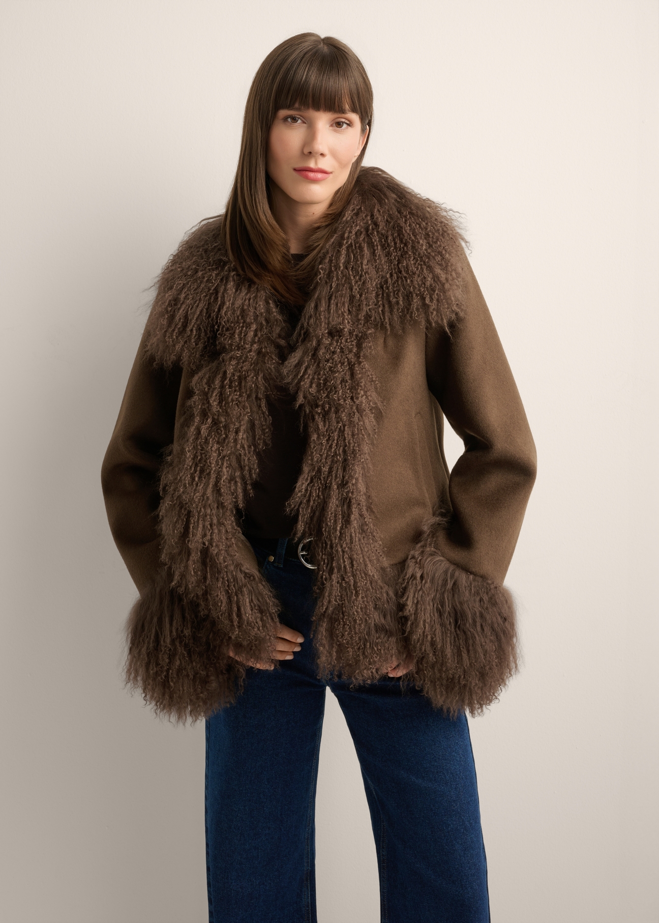 Women's brown wool fur coat FUTDW-0039-1I(Z26), front view of the product on the model. Half of the silhouette visible.
