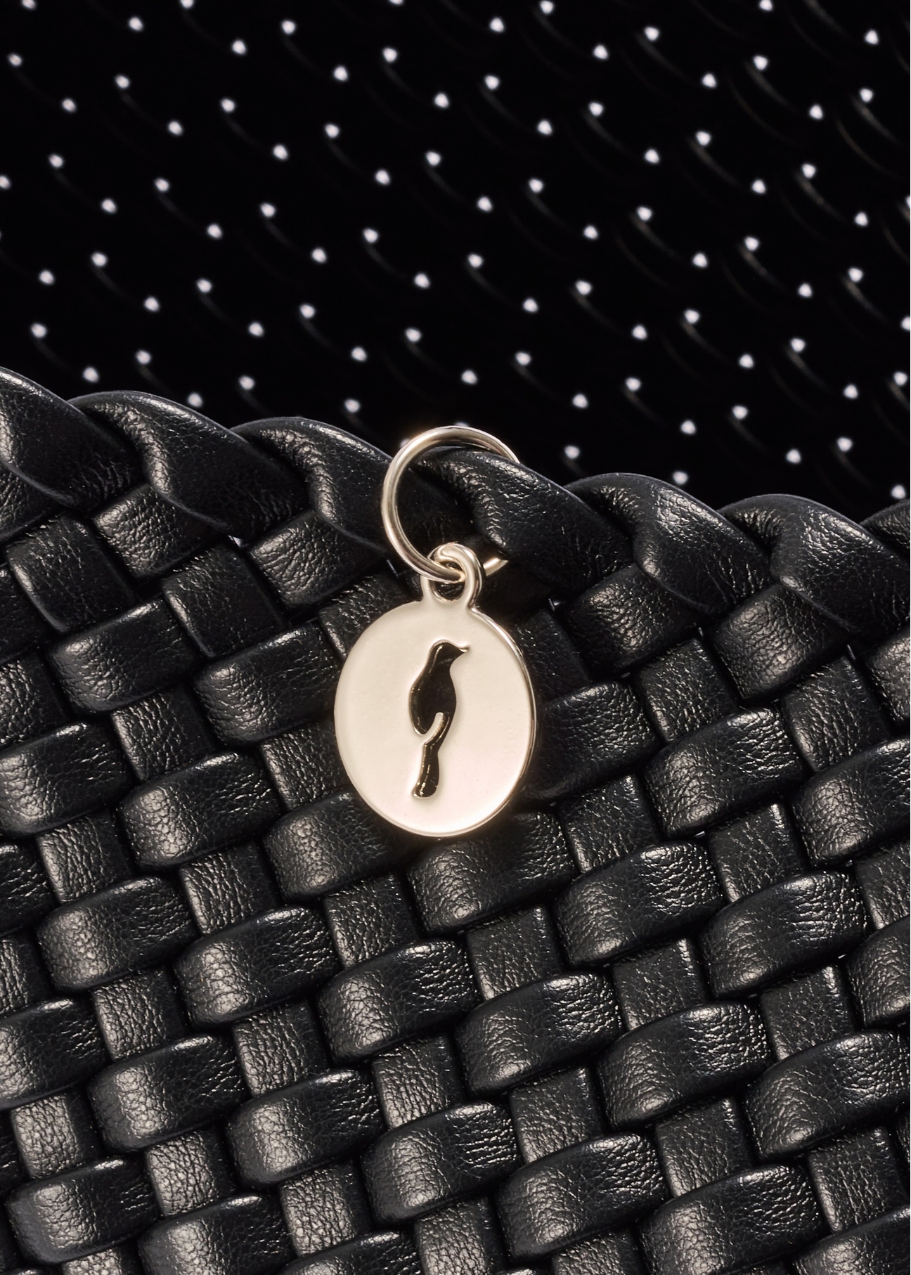 Black woven women's handbag TOREC-1147-99(W26) - close-up detail, on white background.