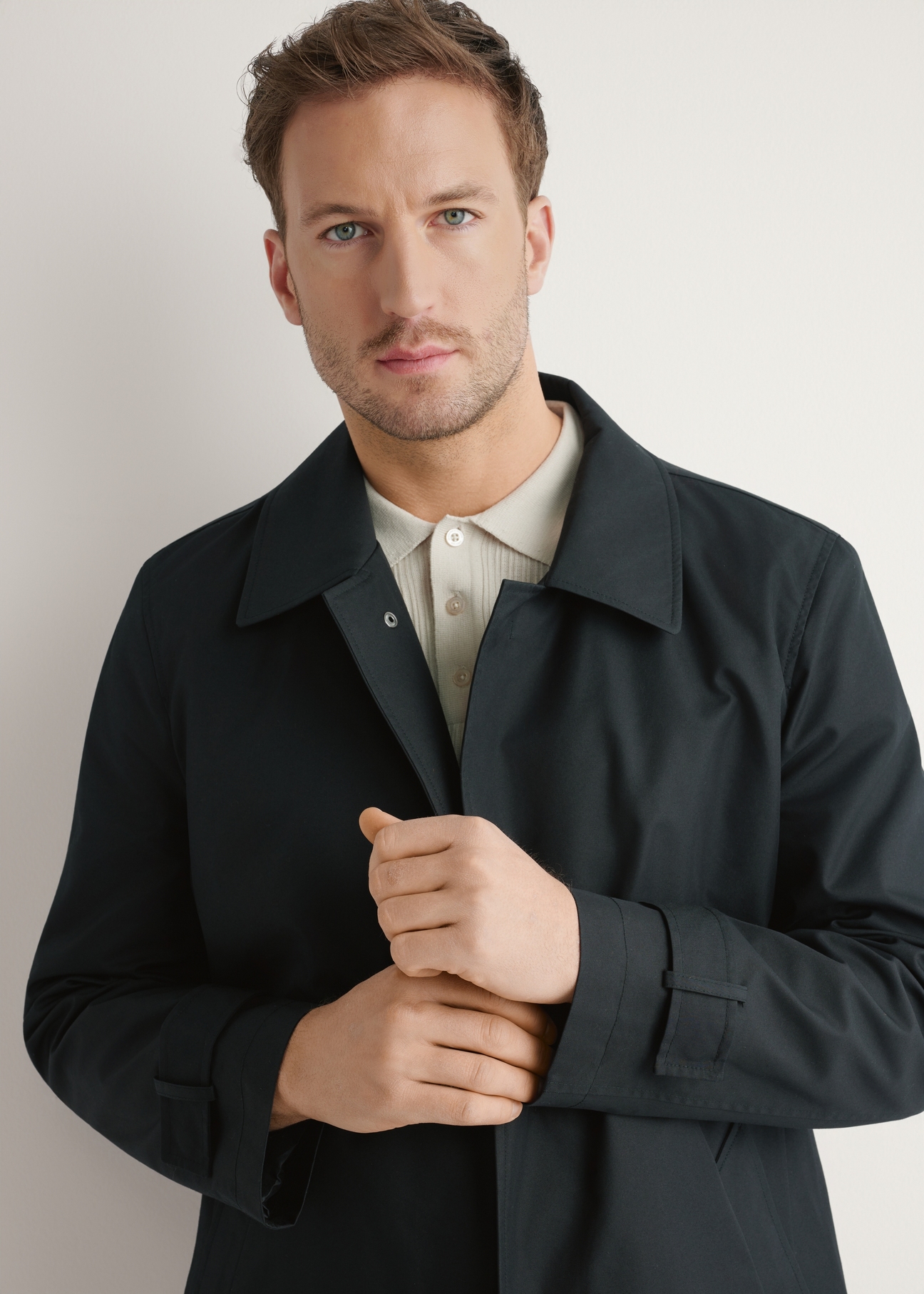 Black men's jacket with insulation KURMT-0408-99(W26), close-up of the product on the model's silhouette.