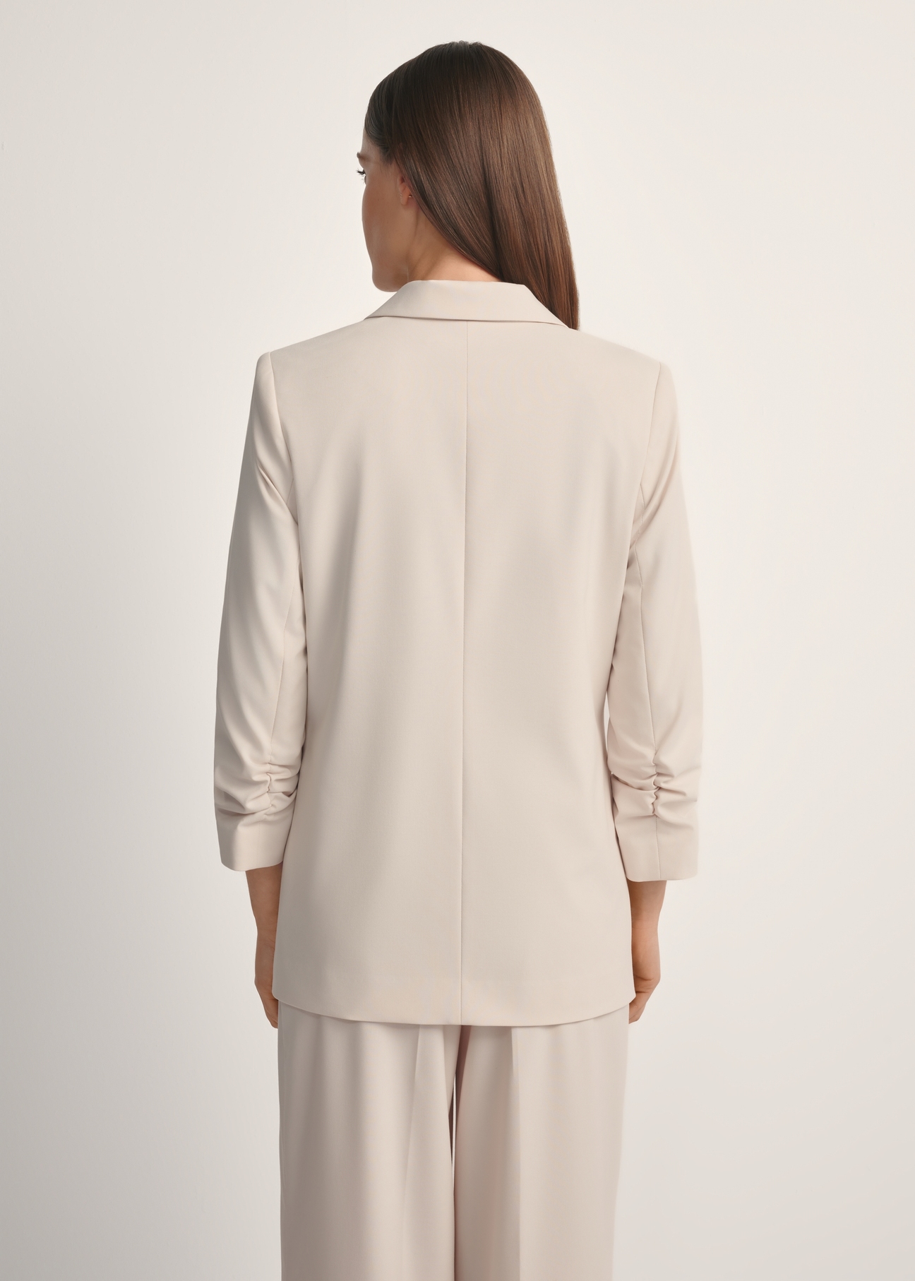 Women's light beige jacket ZAKDT-0043-1A(W26), product view from the back on the model, half of the silhouette visible.