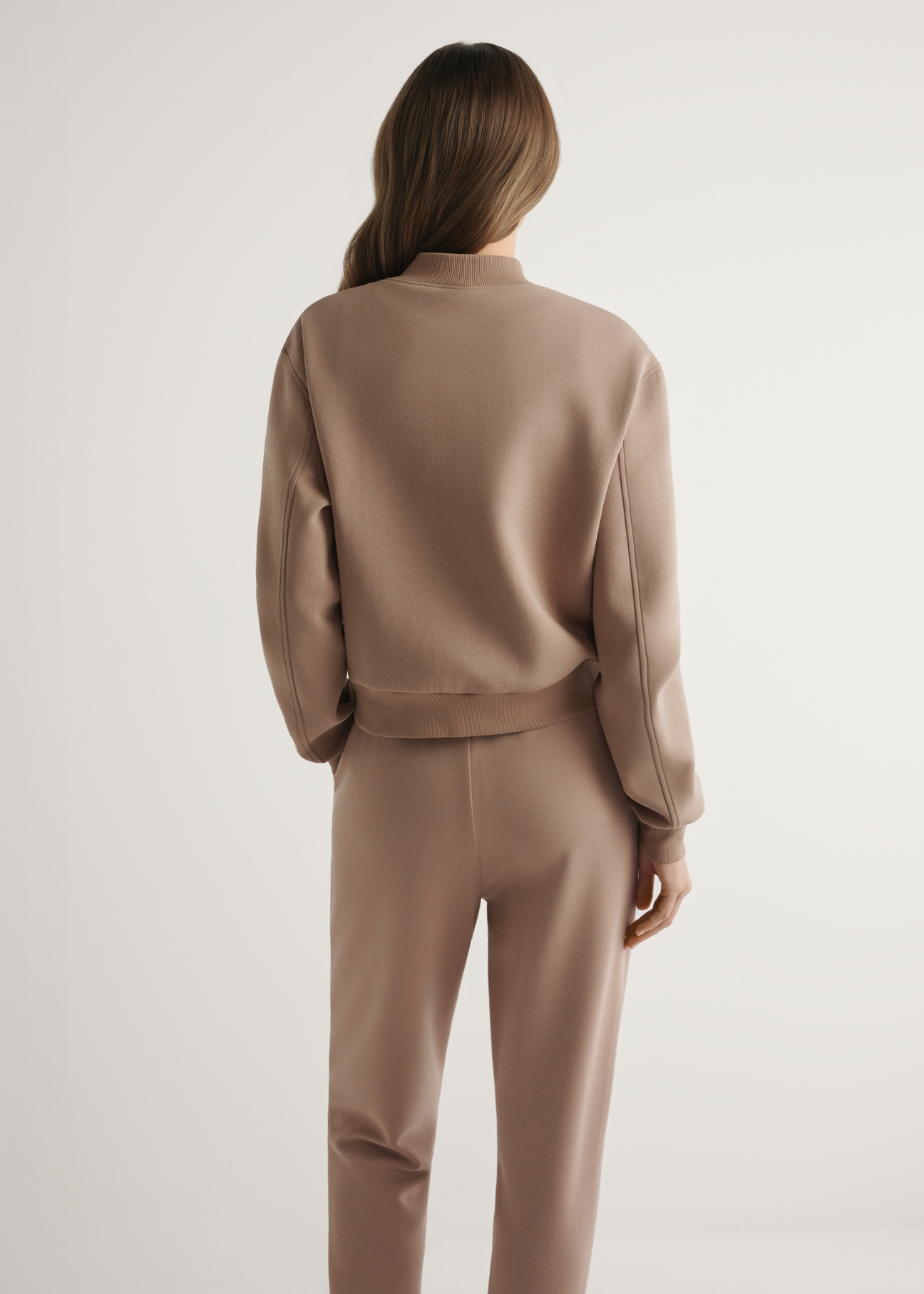 Women's camel sweatshirt BLZDT-0121-1D(W26), back view of the product on the model. Half of the silhouette visible.