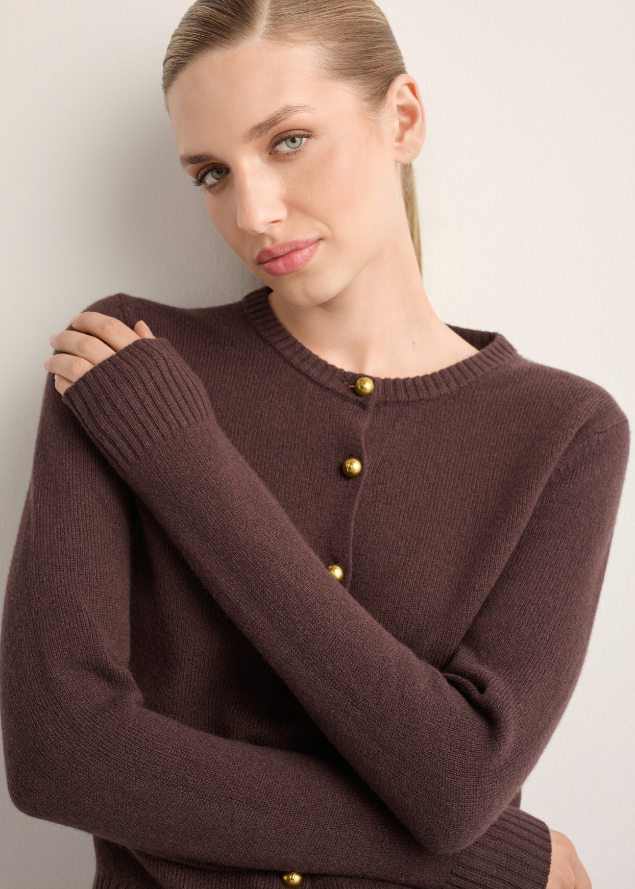 Brown woolen women's cardigan KARDT-0058-1I(Z26), close-up of the product on the model's silhouette.