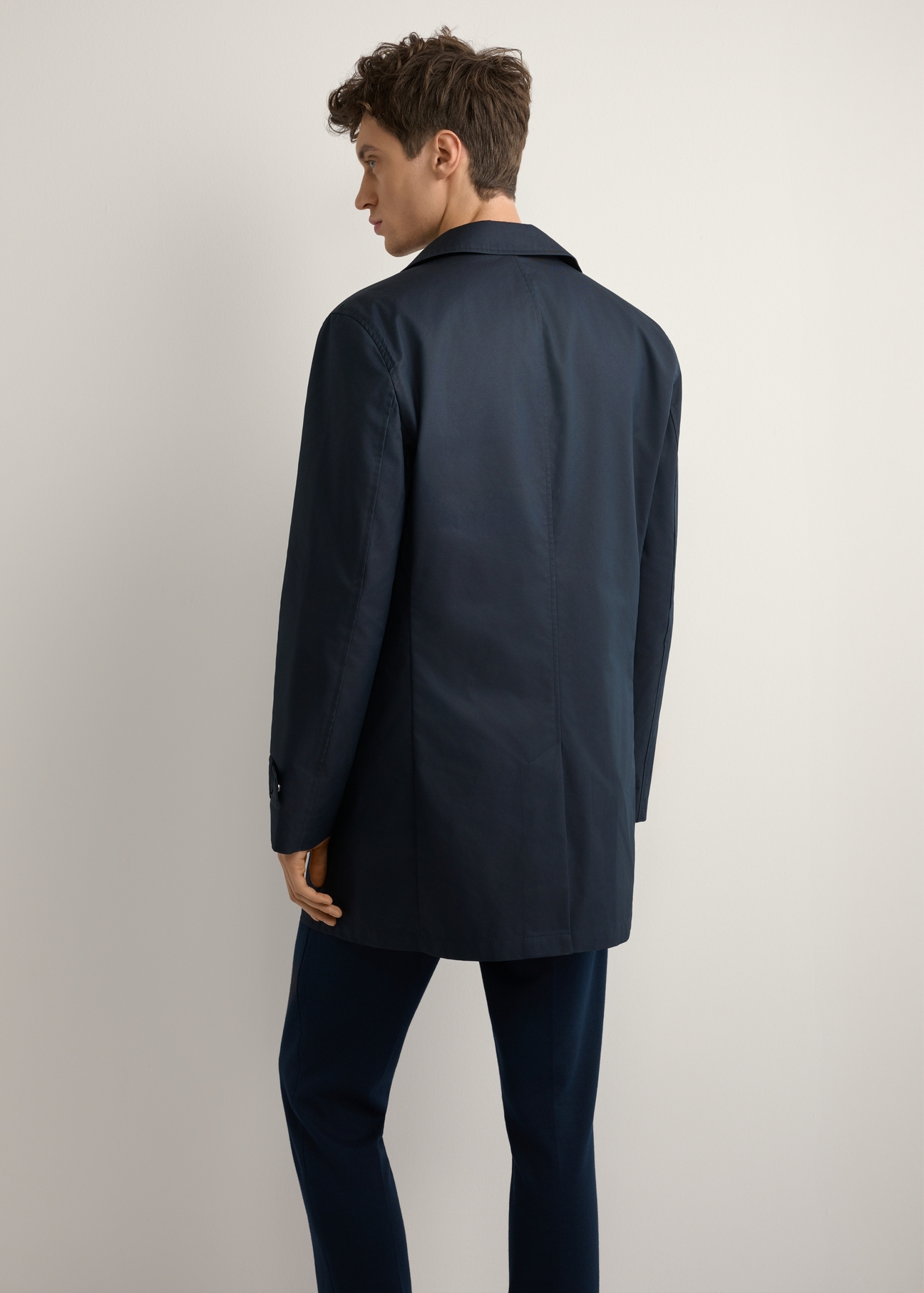 Men's navy blue insulated jacket KURMT-0408-7D(W26) - product view from the back, on a model, against a light background. Half-length silhouette visible.