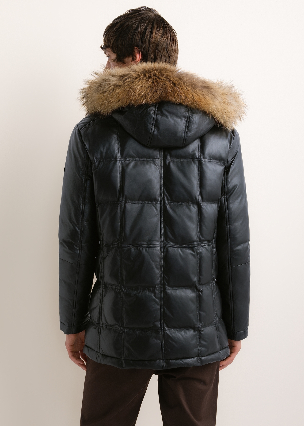 Men's black insulated leather jacket (model KURMS-0348-99(Z26)), shown from the back on a model. Half of the figure is visible.