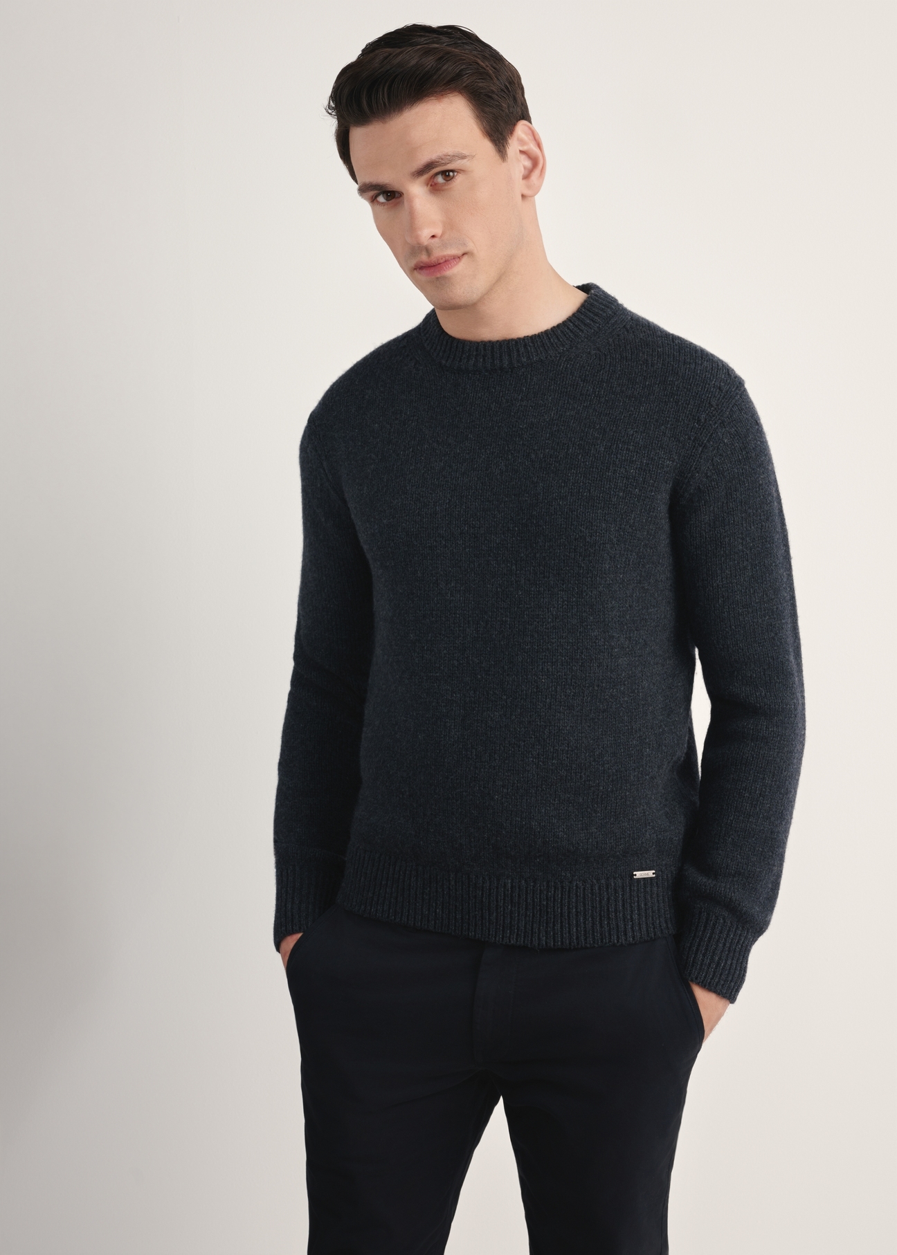 Graphite men's sweater SWEMT-0172-99(Z25), front view of the product on the model. Half of the silhouette visible.