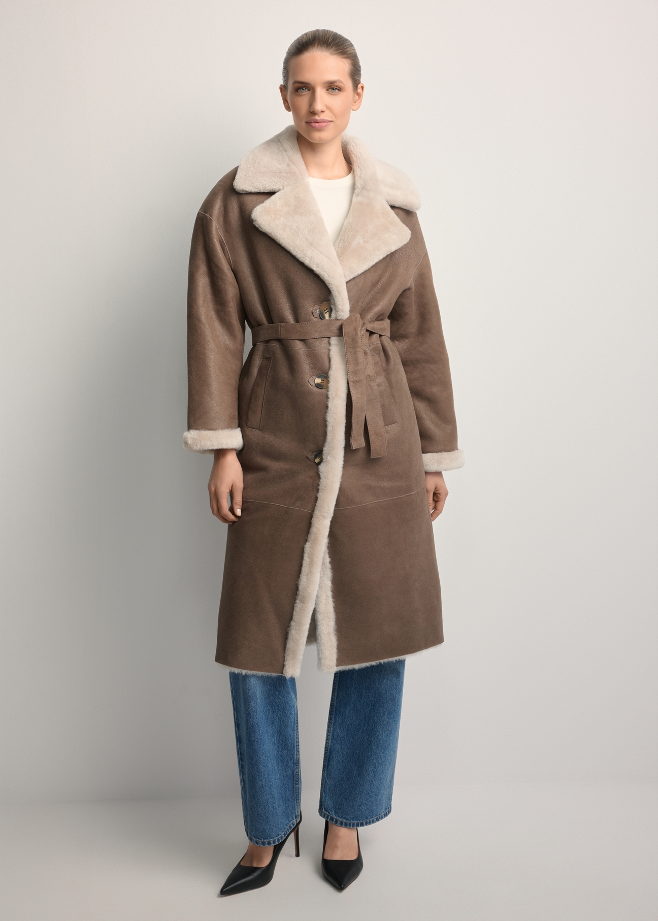 Long classic brown women's sheepskin coat KOZDS-0071-3091(Z25), front view of the product on the model. Full body visible.