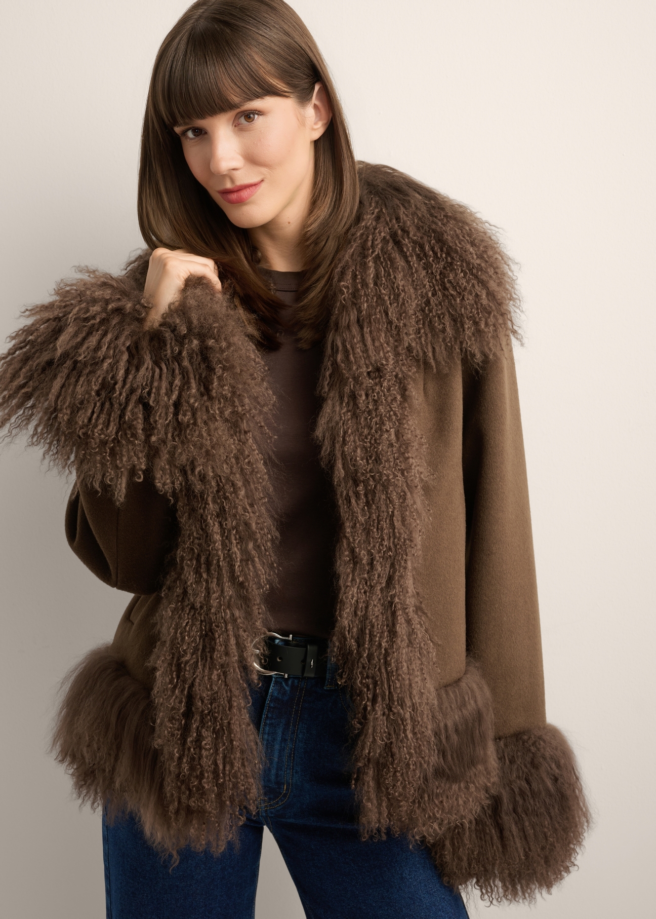 Women's brown wool fur coat FUTDW-0039-1I(Z26), front view of the product on the model. Half of the silhouette visible.