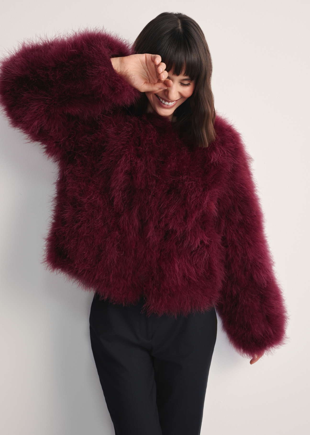 Women's turkey feather jacket FUTDF-0097A-3183(Z25), front view of the product on the model. Half of the silhouette visible.