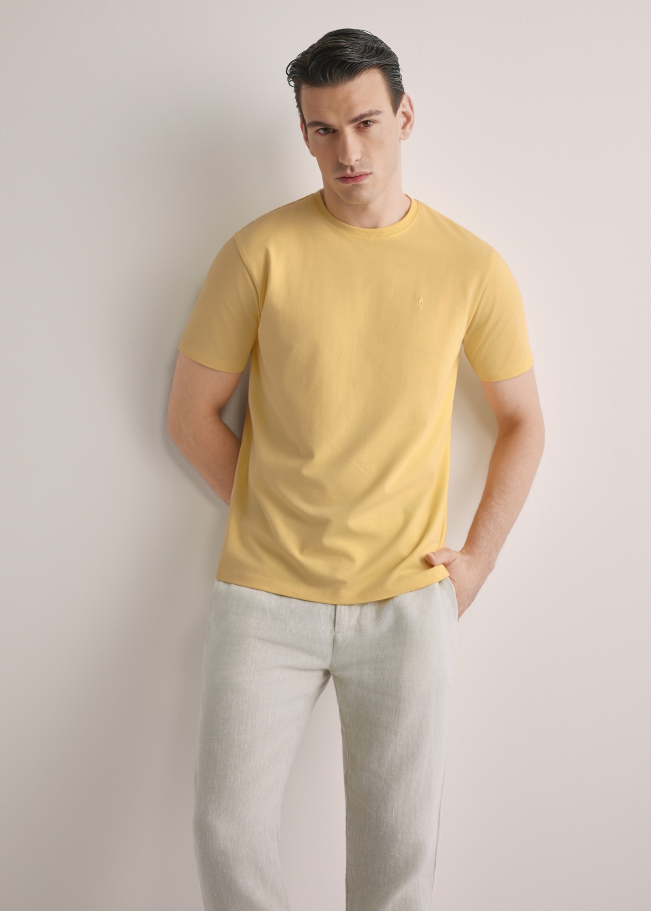 Men's yellow T-shirt TSHMT-0120-2B(W26), front view of the product on the model. Half of the silhouette visible.