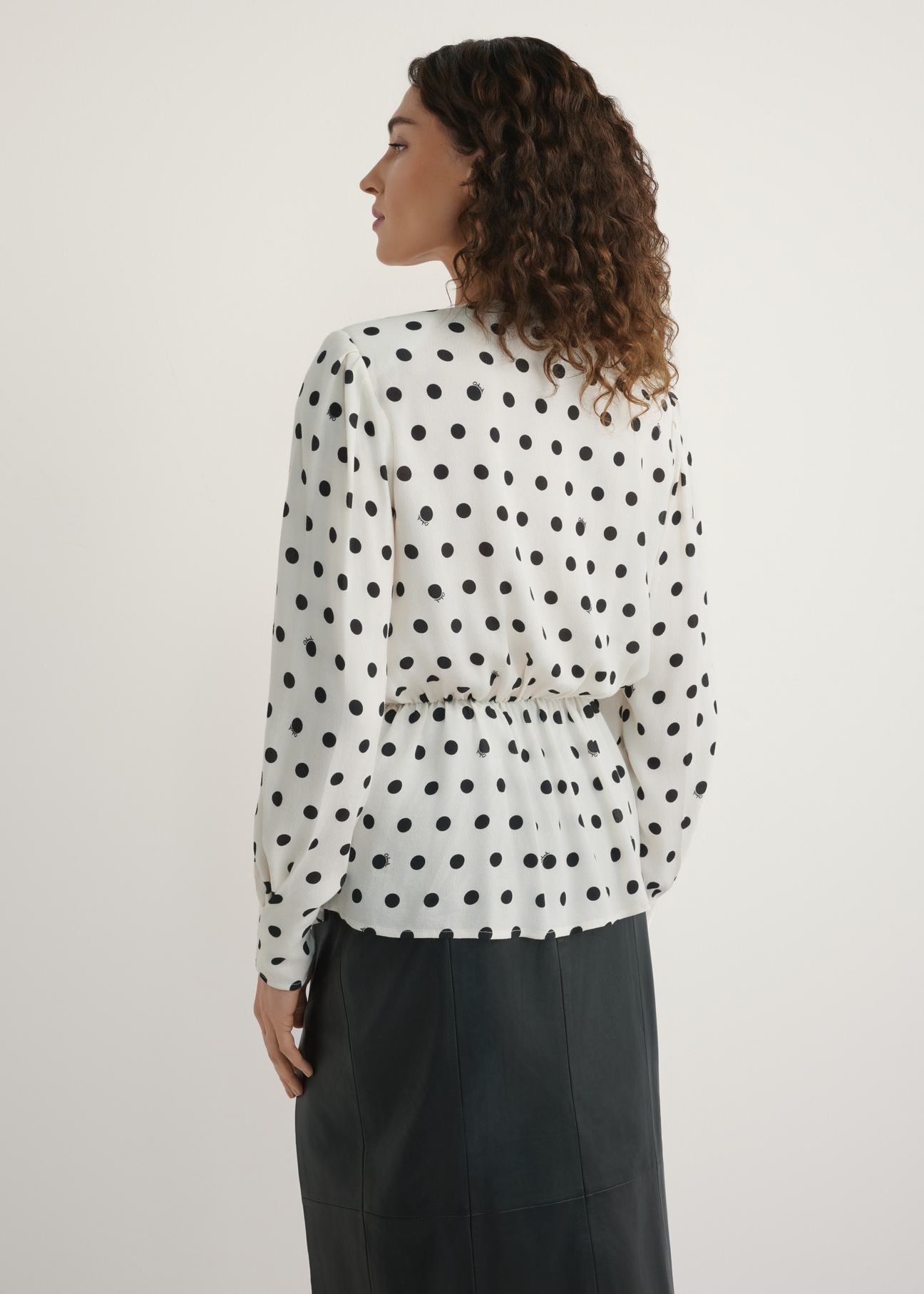 Women's cream polka dot blouse BLUDT-0204-0P(W26), back view of the product on the model. Half of the silhouette visible.