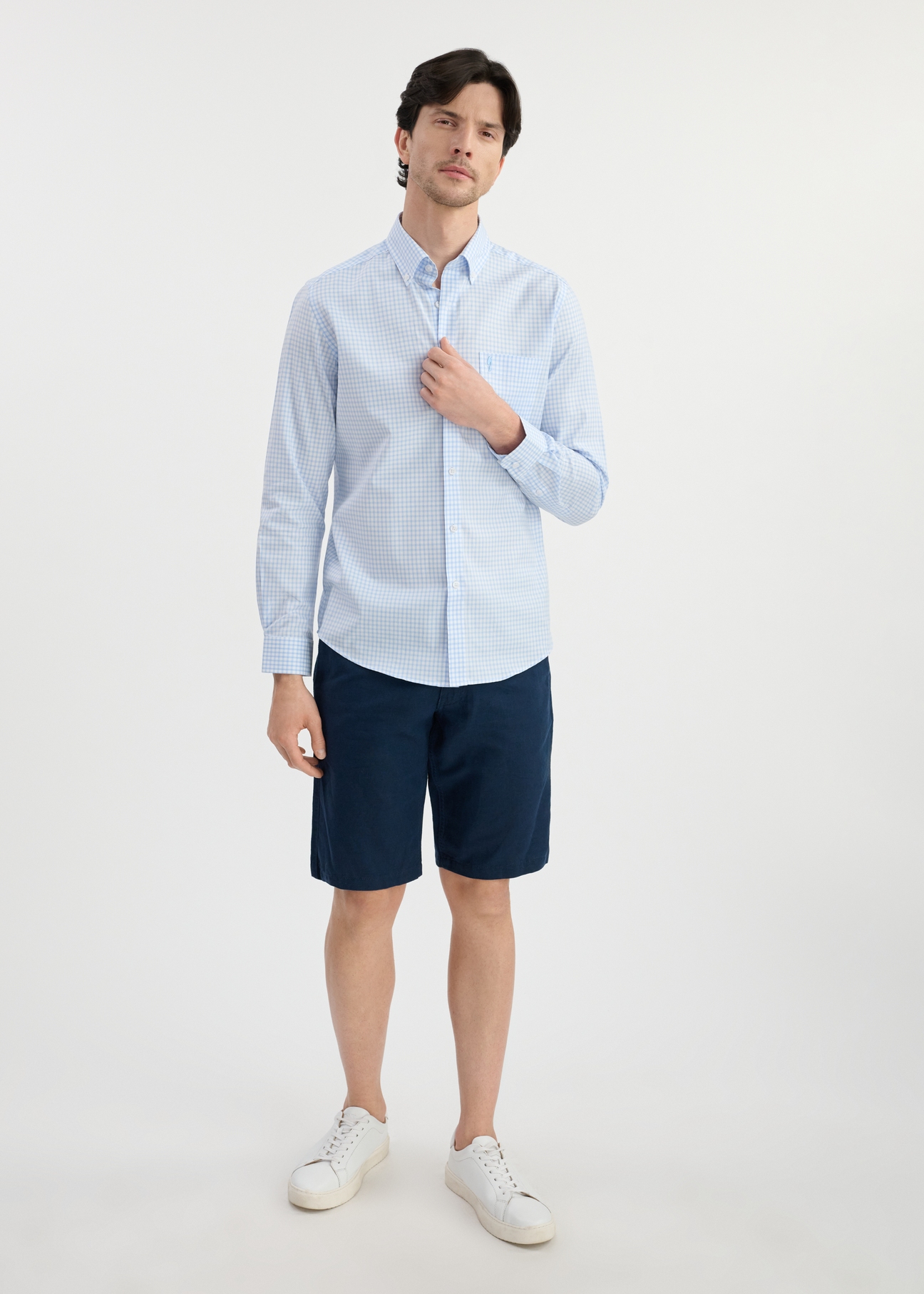 Men's light blue checkered cotton shirt KOSMT-0277-63(W25) - front view on model on white background. Full silhouette visible.