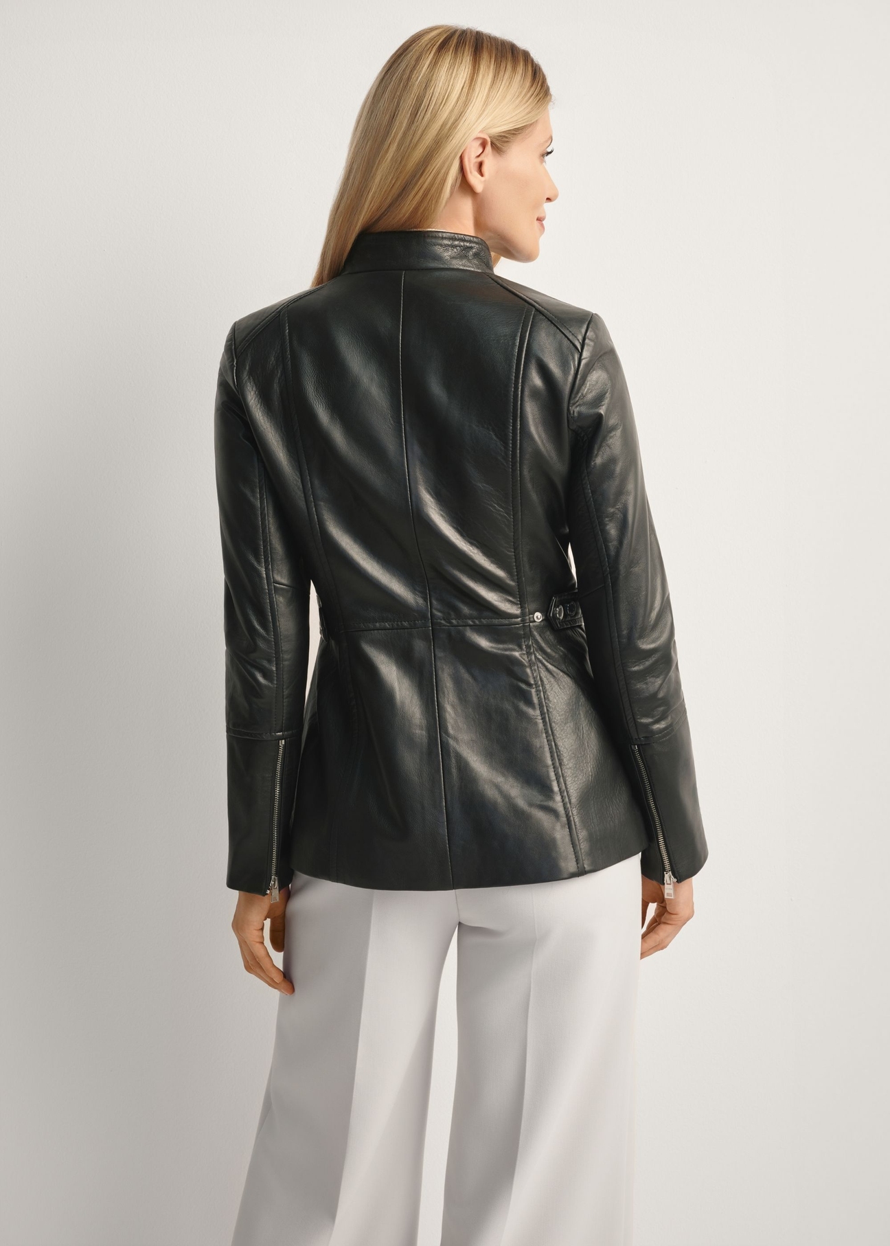 Women's fitted leather jacket KURDS-0424-99(KS), back view of the product on the model. Half of the silhouette visible.