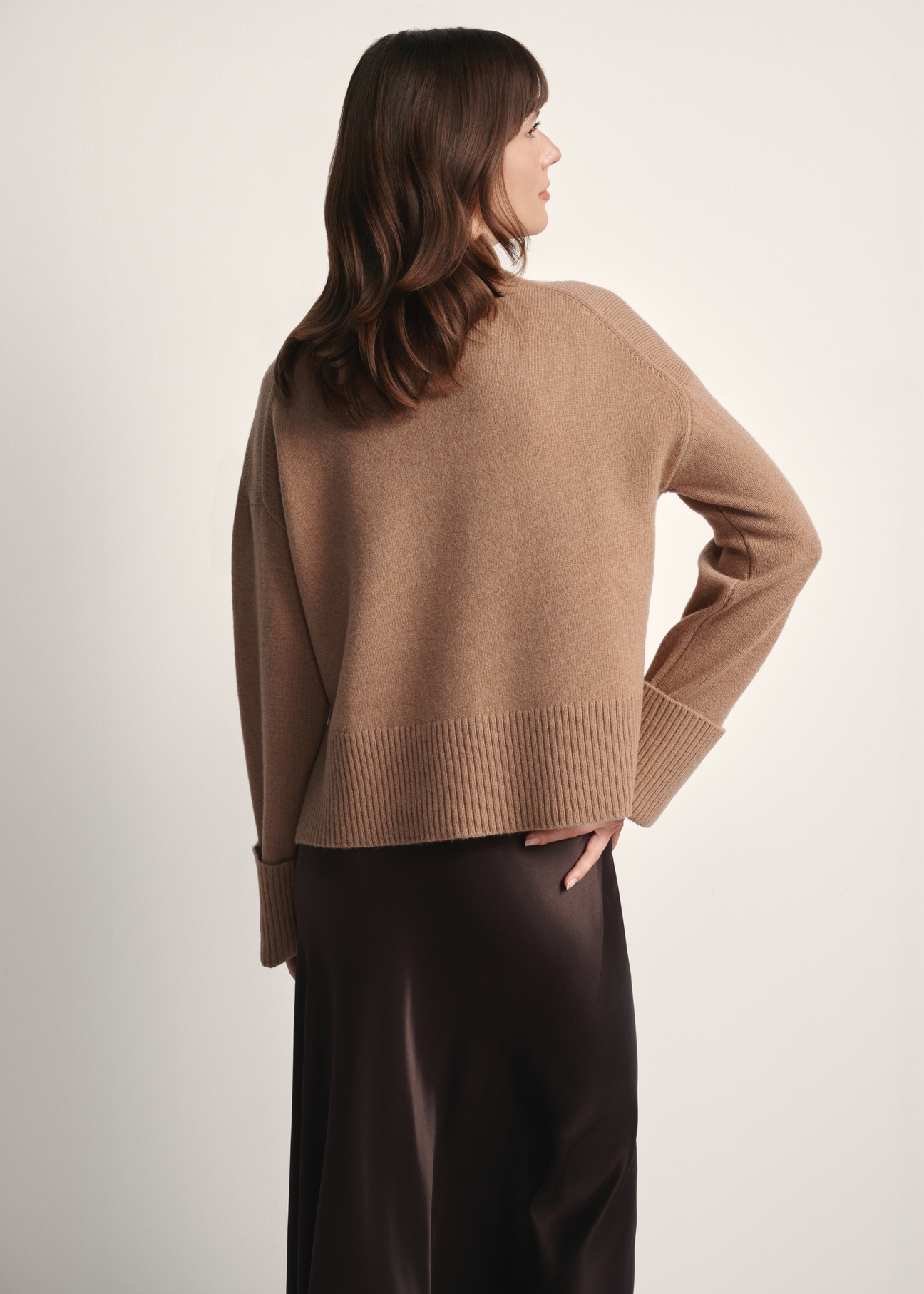 Women's camel wool sweater SWEDT-0244-24(Z25), back view of the product on the model. Half of the silhouette visible.