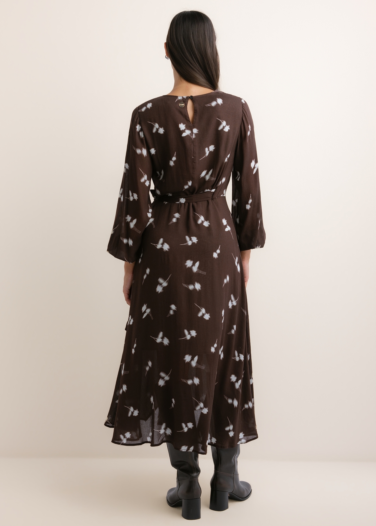 Brown floral midi dress SUKDT-0291-1P(Z26), back view of the product on the model. The entire silhouette is visible.