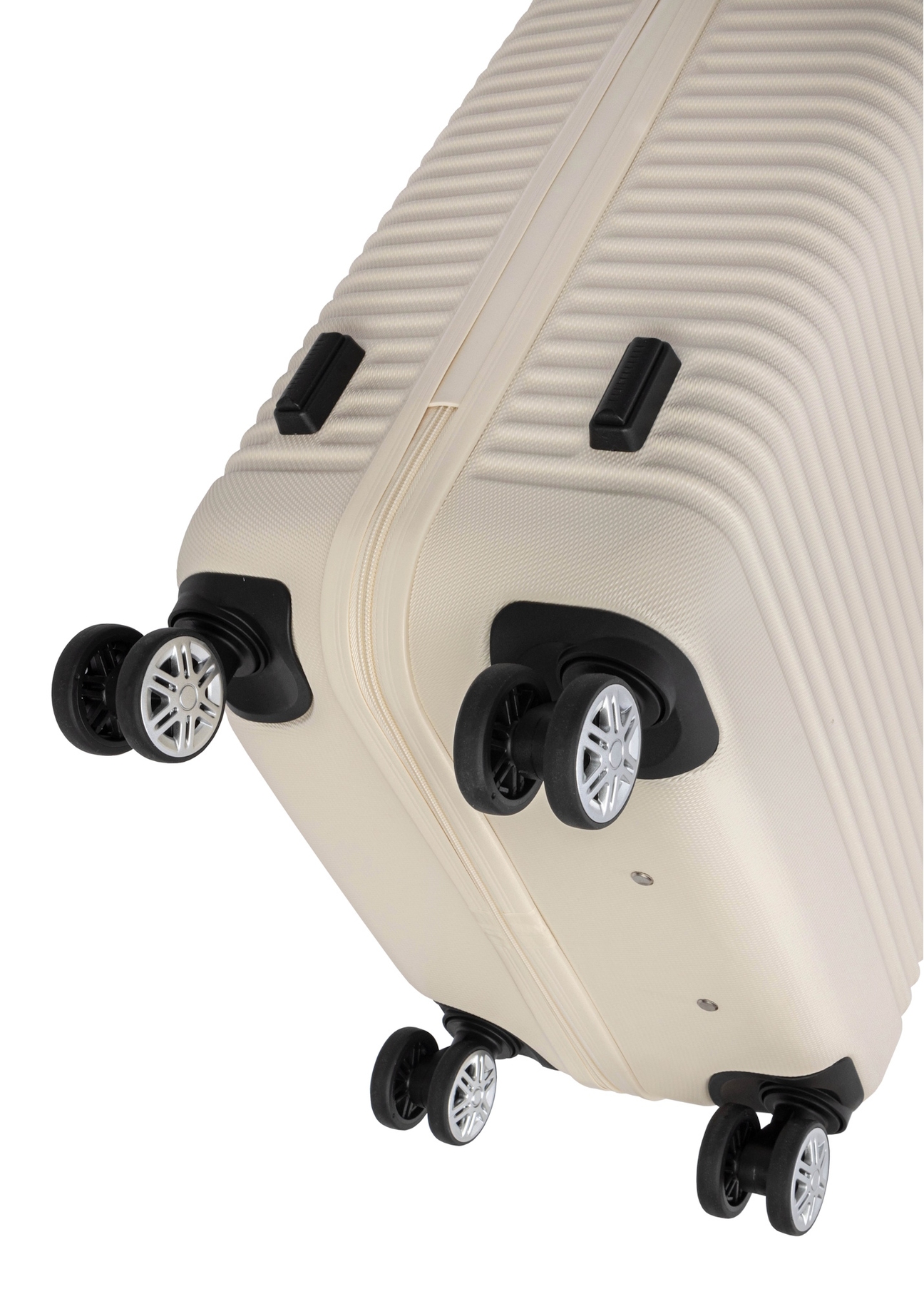 Small suitcase on wheels WALAB-0040-0C-19(W26), close-up of the product wheels on a white background.