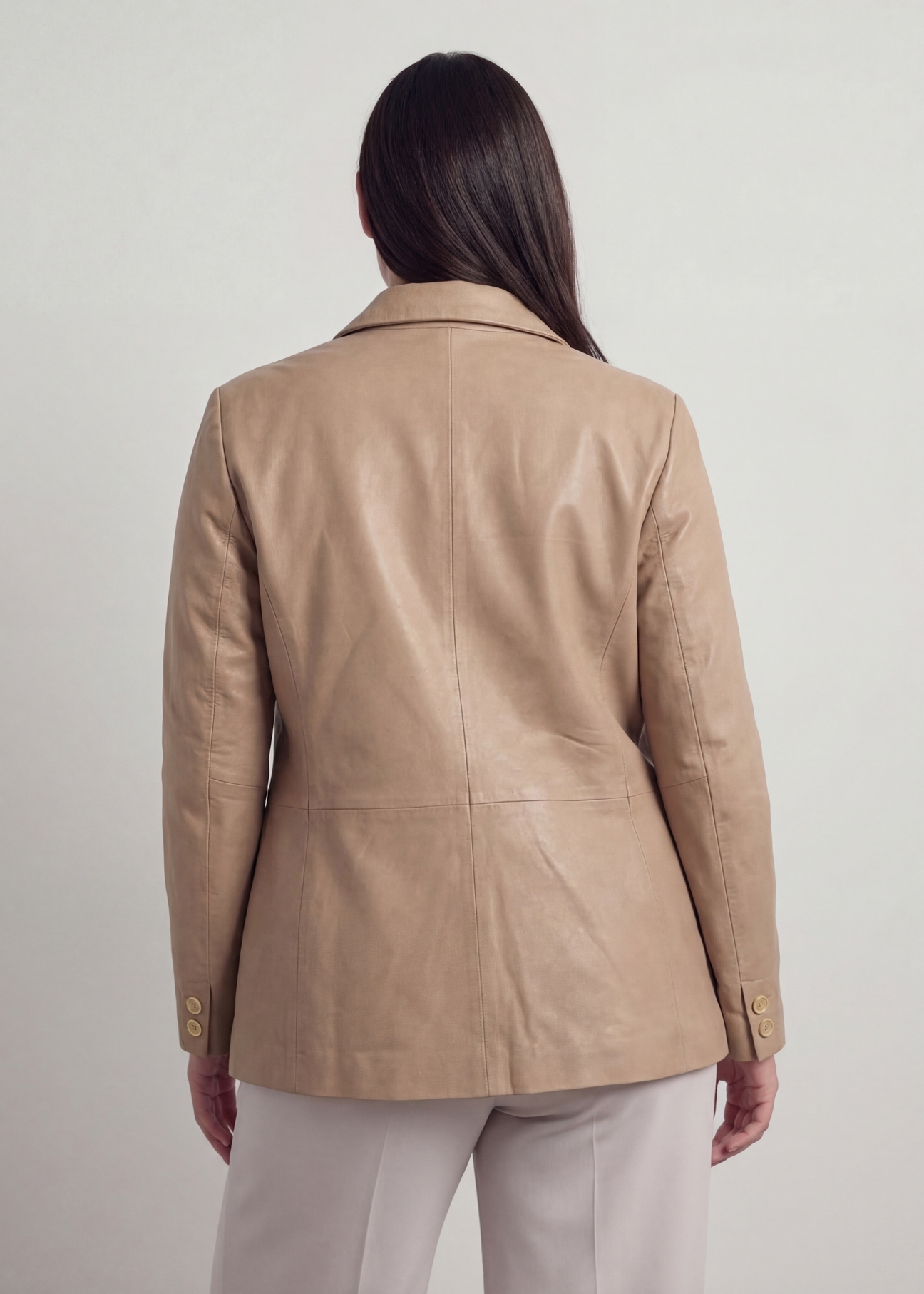 Beige women's PLUS SIZE leather jacket KURDS-0645L-1B(W26), product view from the back on the model, half of the silhouette visible.