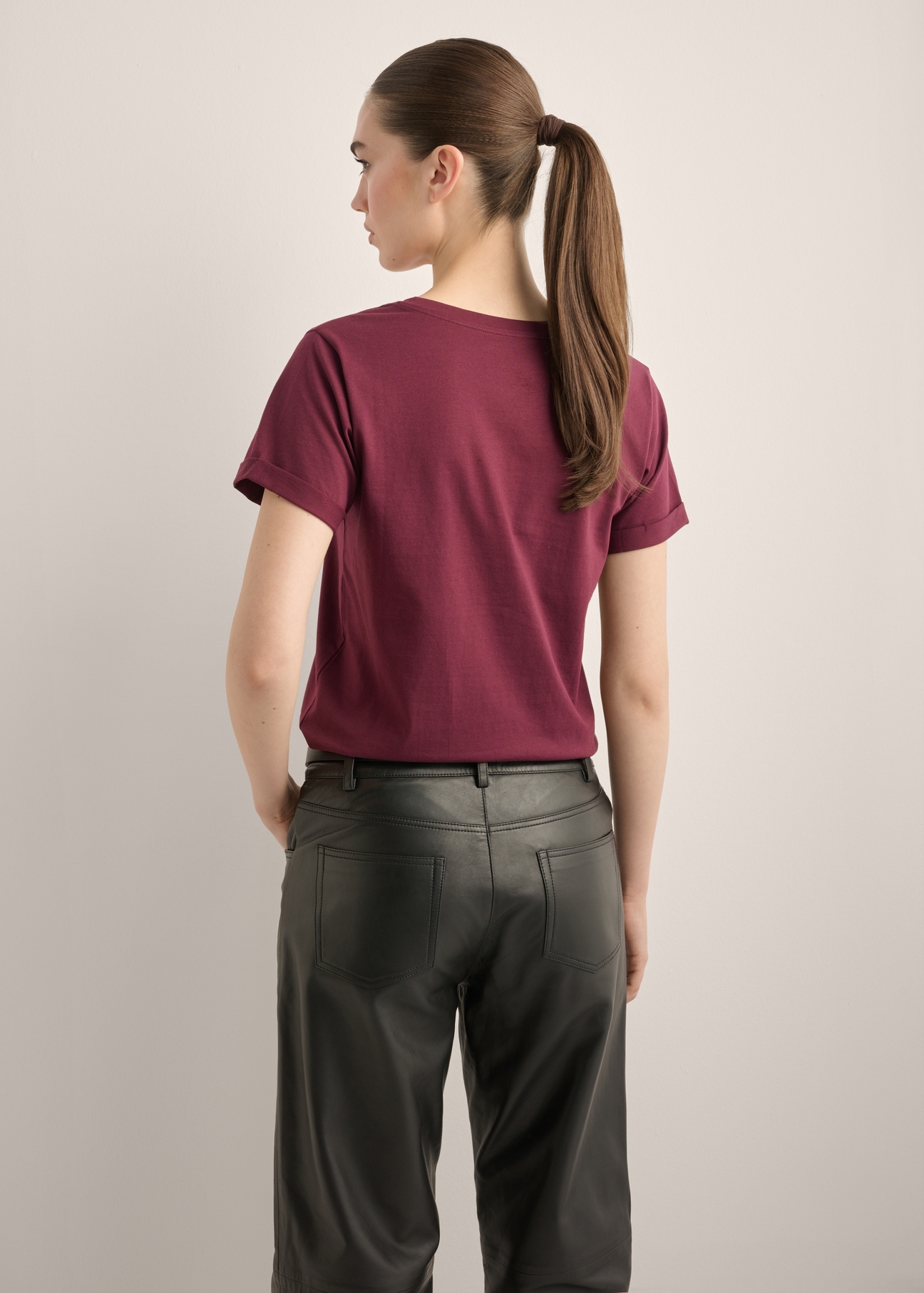 Burgundy women's T-shirt TSHDT-0149-4D(Z26), product view from the back on the model. Half of the silhouette visible.