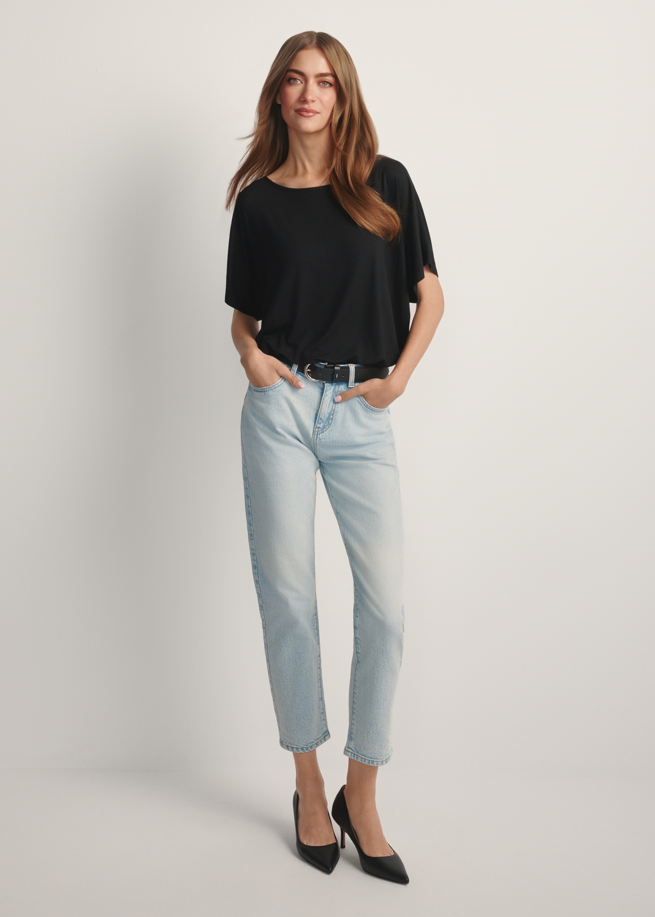 Women's black ribbed blouse BLUDT-0170-99(W25), front view of the product on the model. Full body visible.