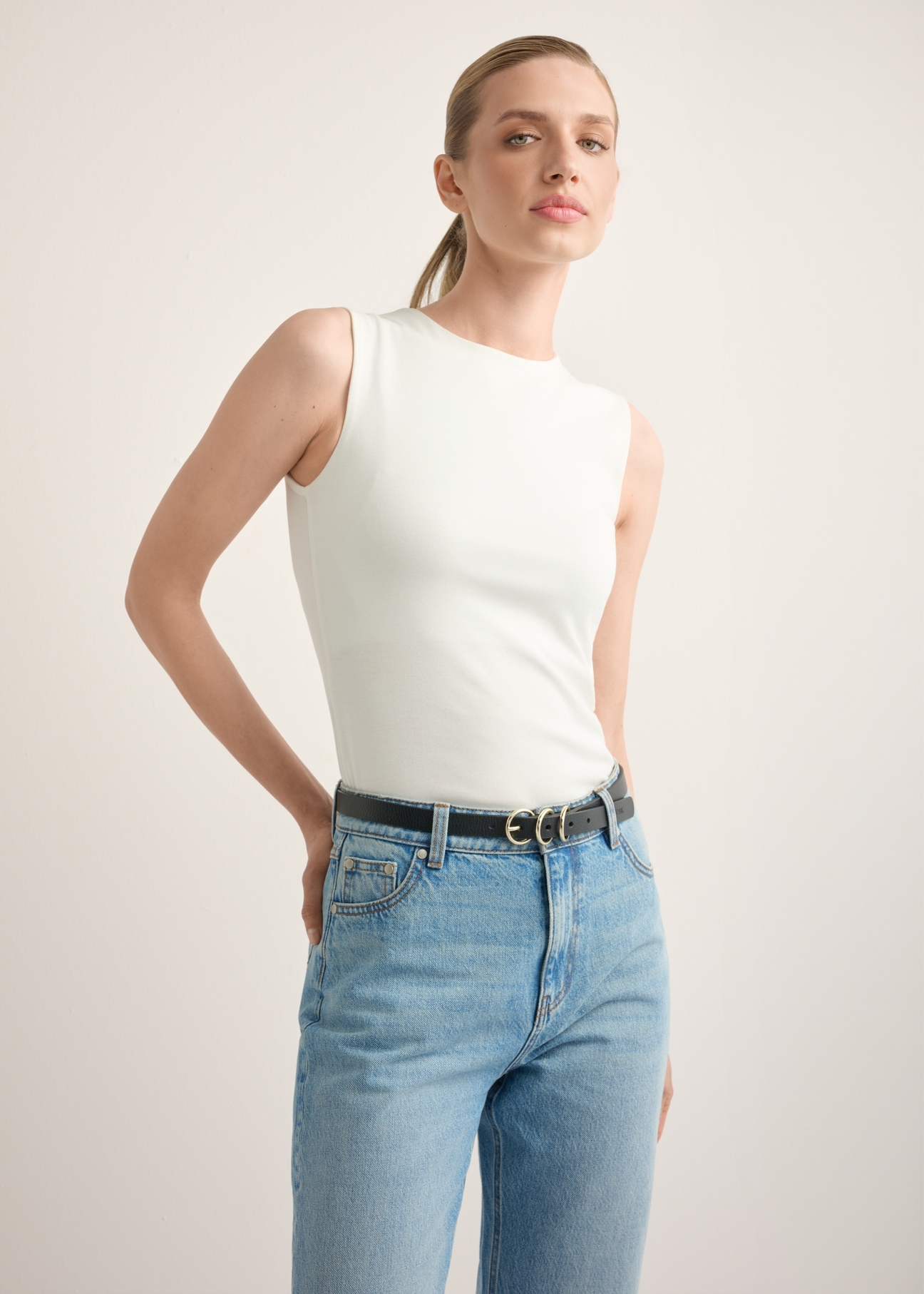 Women's white cotton blouse BLUDT-0211-0B(Z26), front view of the product on the model. Half of the silhouette visible.