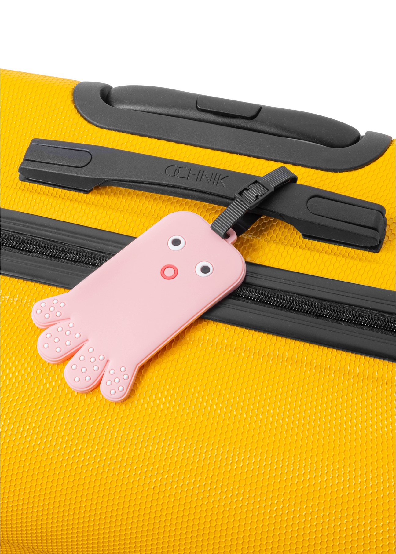 Luggage tag AW-012-0004-31(W25), product view on a suitcase on a white background.