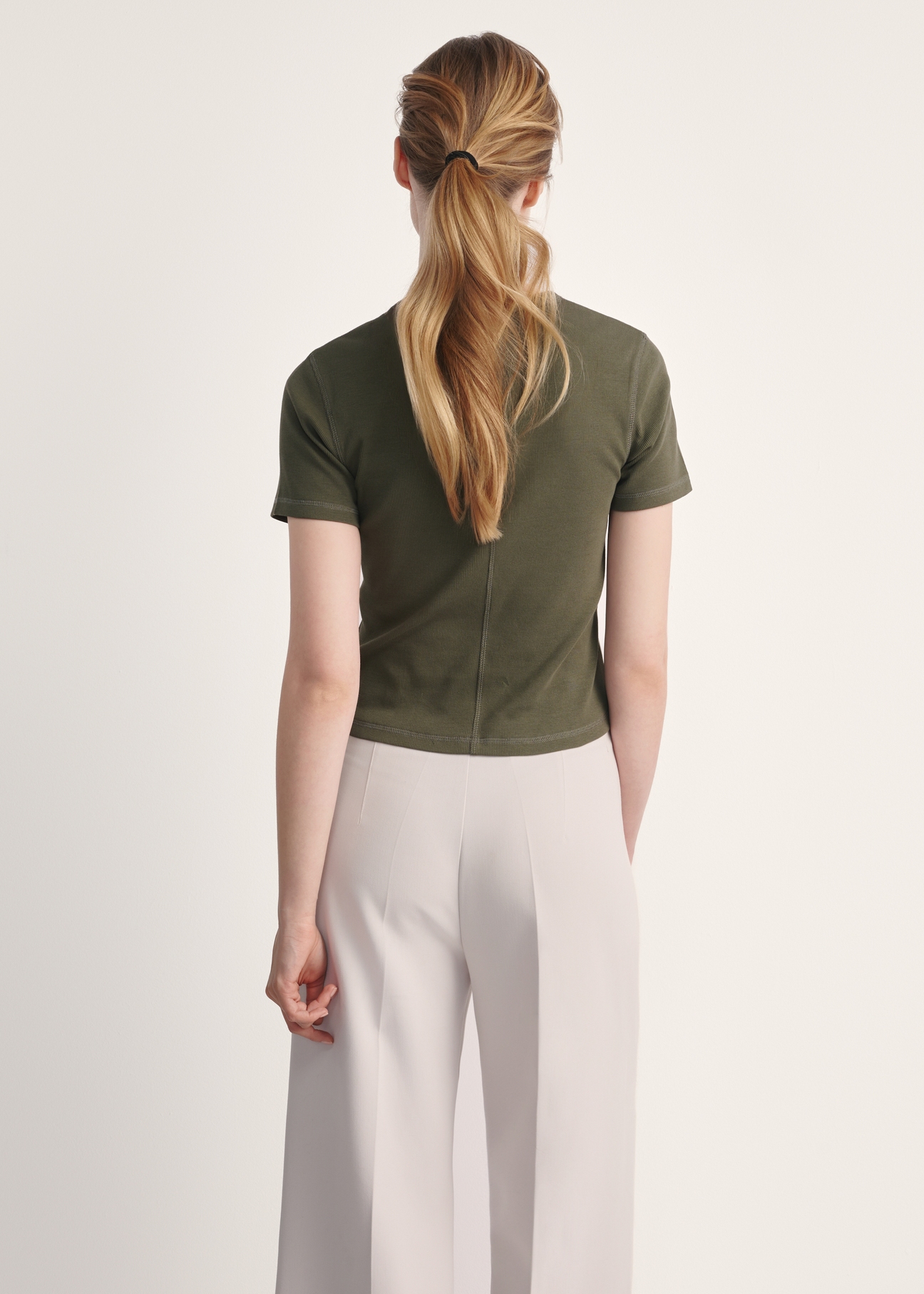 Women's khaki T-shirt TSHDT-0145-55(Z25), product visible from the back on the model, the entire silhouette is visible.