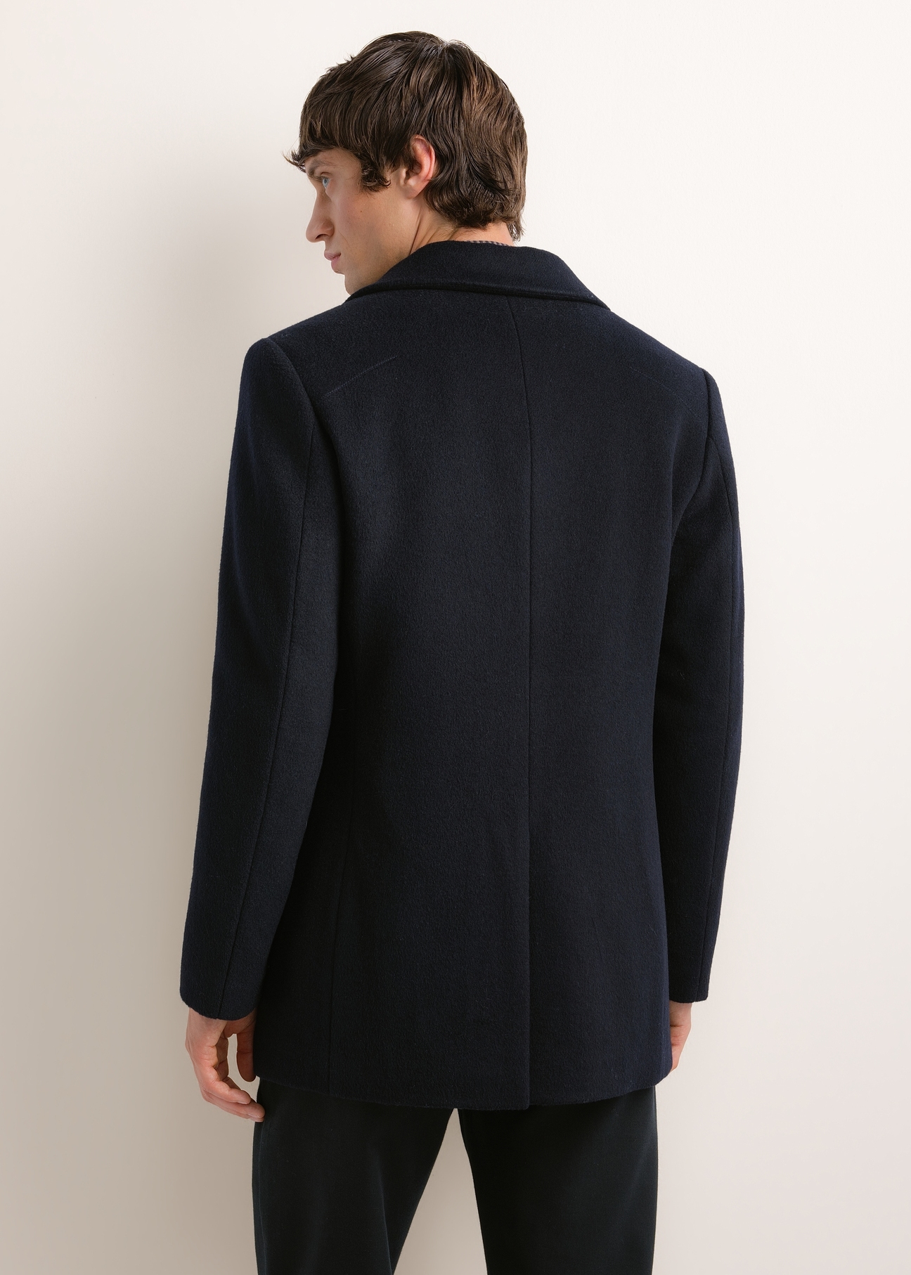 Men's navy wool coat PLAMT-0011-7D(Z26), rear view on a model. Half of the figure is visible.