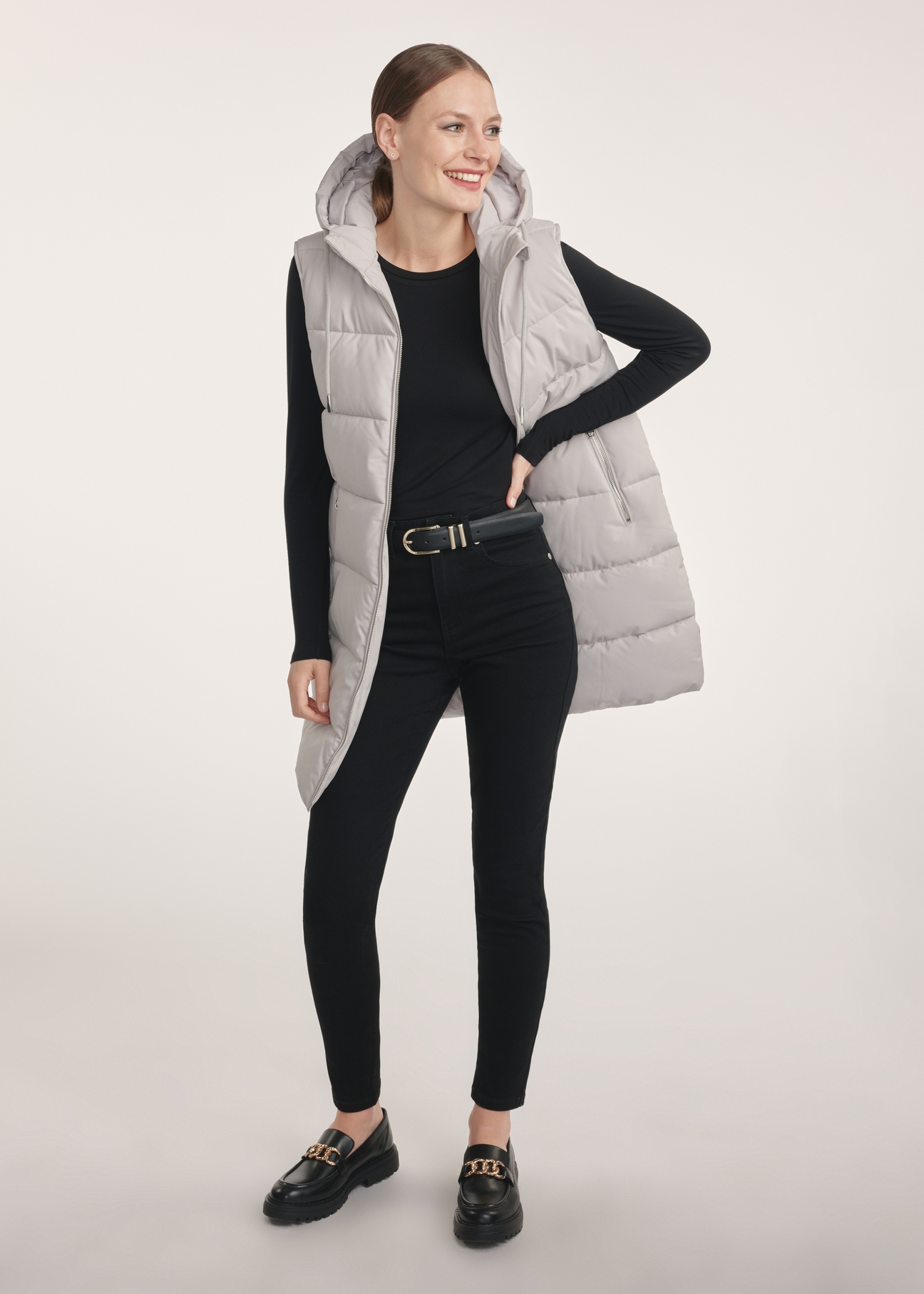 Gray long women's vest KAMDT-0034-91(Z25), front view of the product on the model, the entire silhouette is visible.