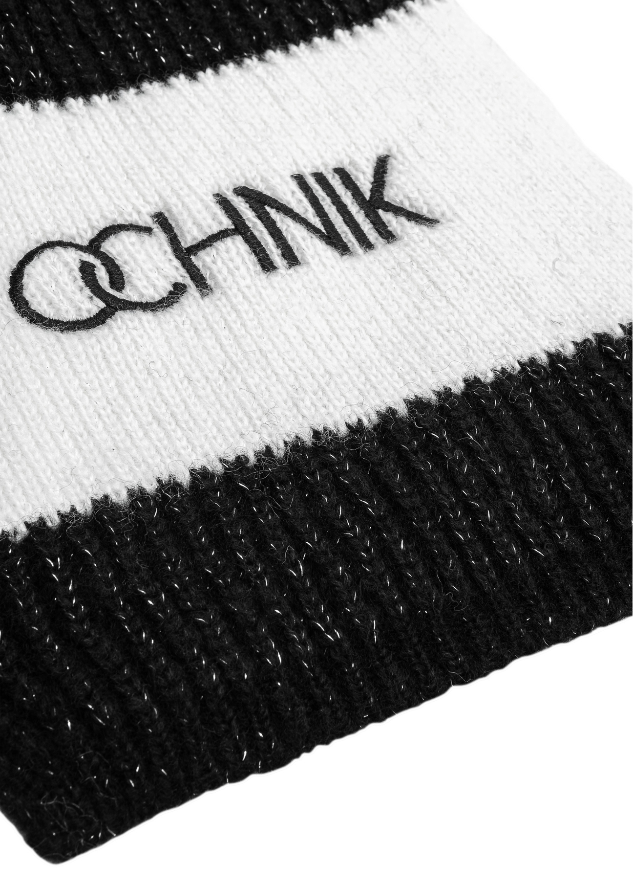 Black women's scarf with OCHNIK SZADT-0125A-99(Z25) logo, close-up of product detail, view on white background.