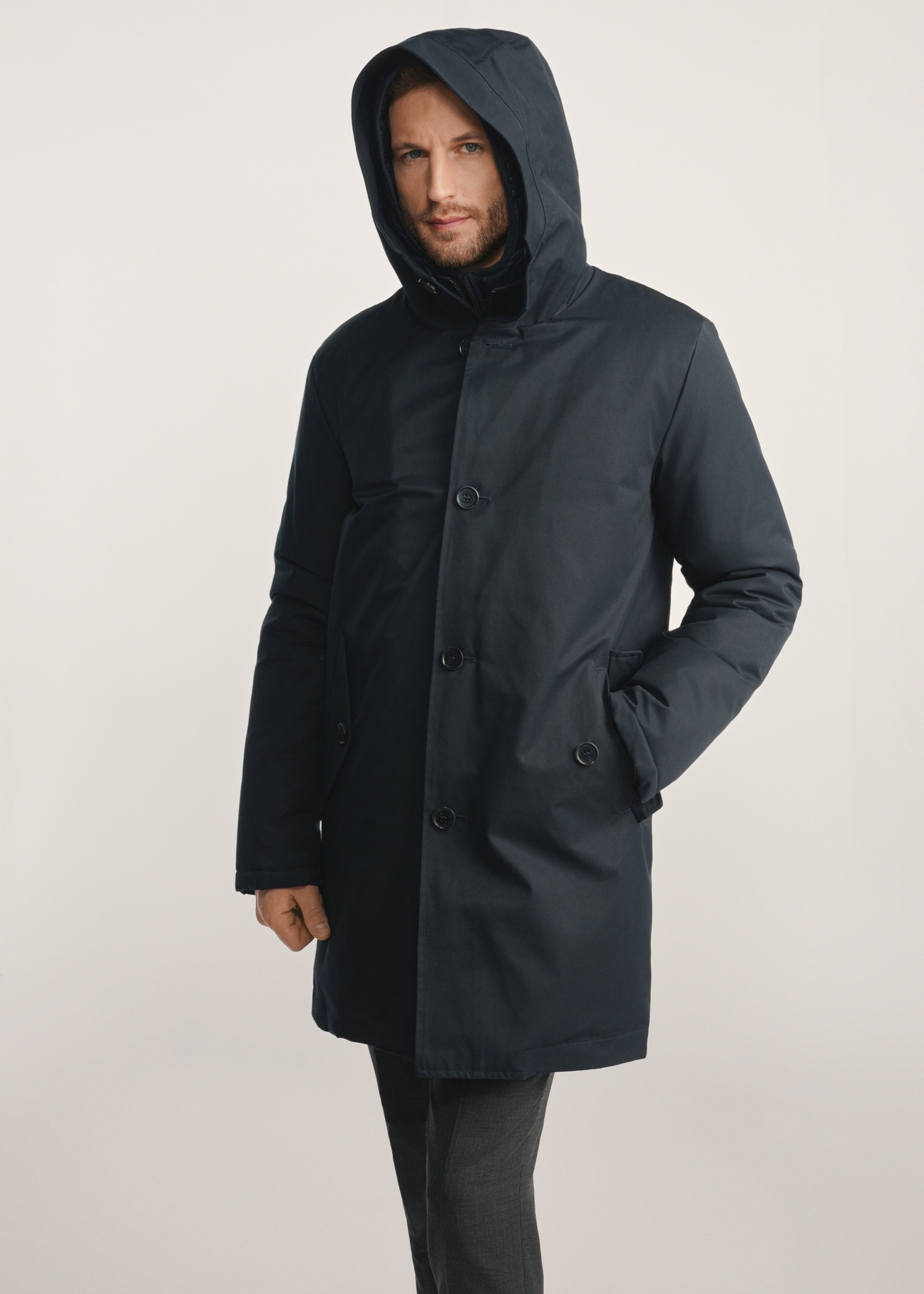 Navy blue men's winter jacket KURMT-0387-69(Z25), product visible from the front on the model, half of the silhouette visible.