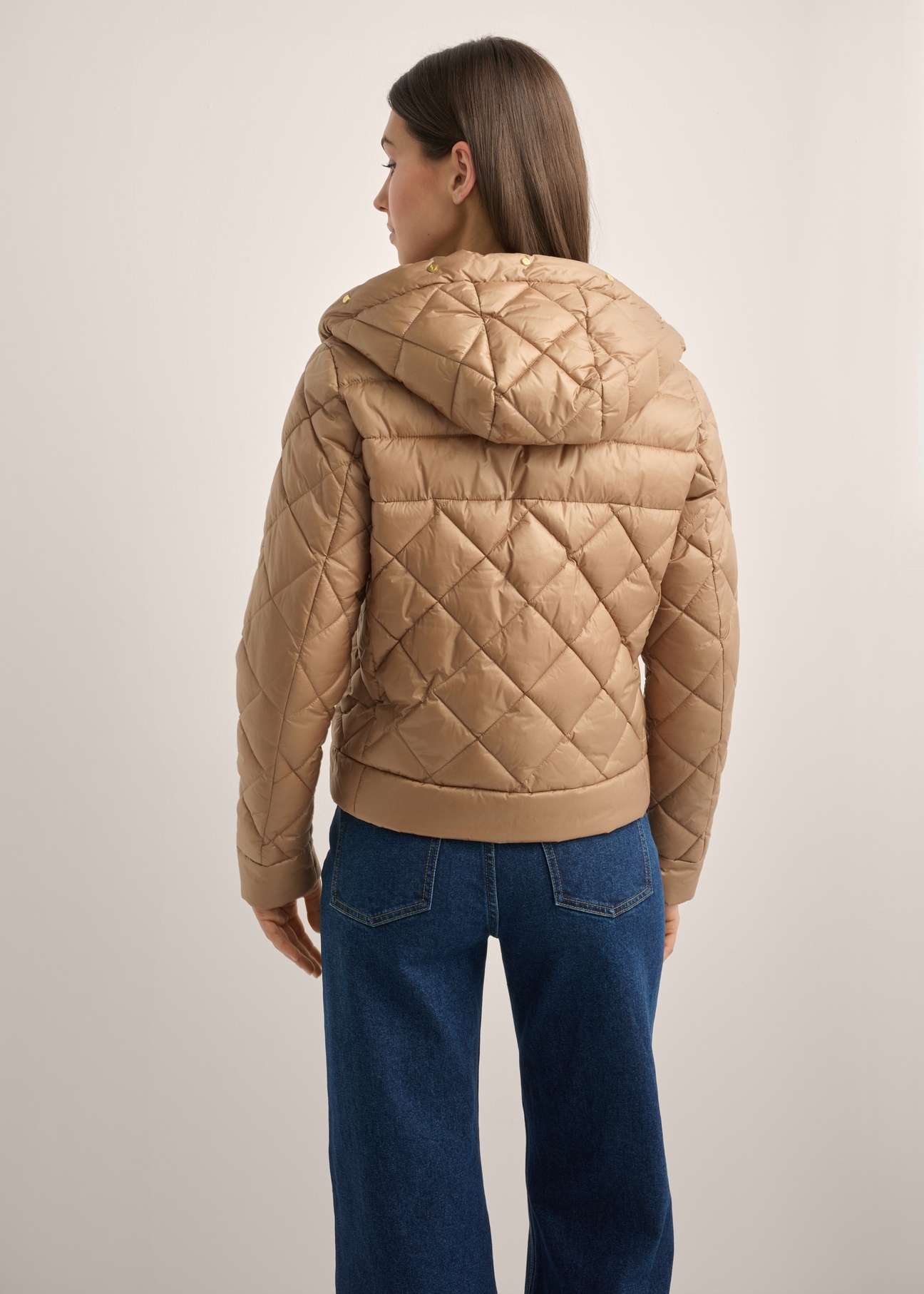 Women's camel quilted jacket KURDT-0678-1D(Z26), product view from the back on the model. Half of the silhouette visible.