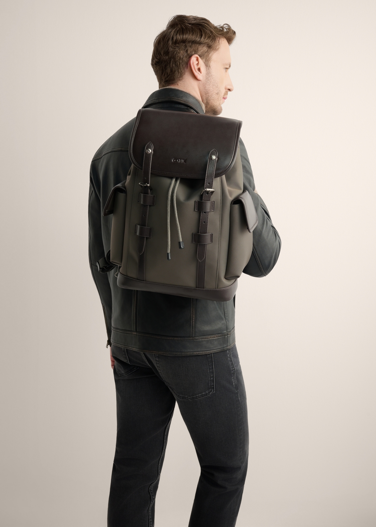 Men's khaki backpack TORMN-0436-8B(Z26), front product view on the model's silhouette.