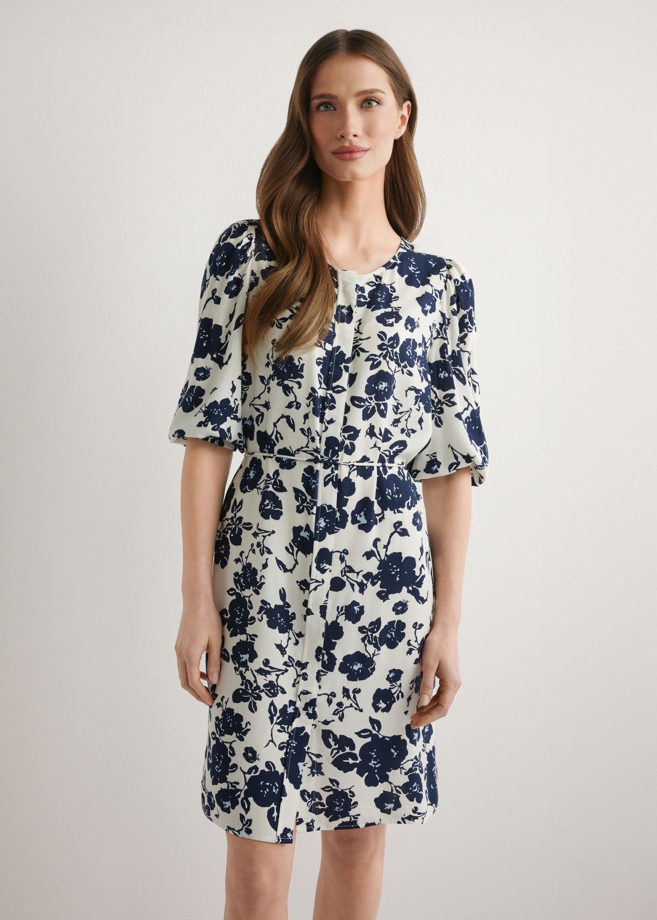 Navy blue floral viscose dress SUKDT-0271-7P(W26), front view of the product on the model. Half of the silhouette visible.