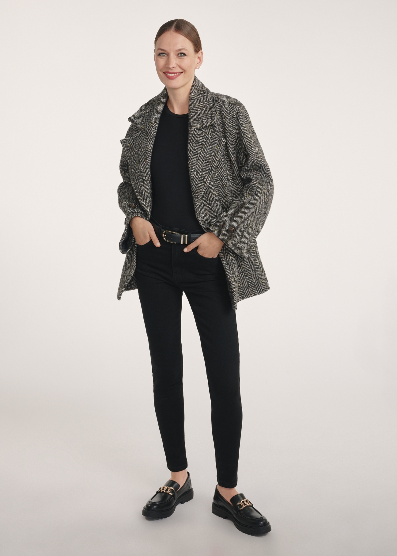 Gray short women's coat PLADT-0062-91(Z25), front view of the product on the model, the whole silhouette is visible.