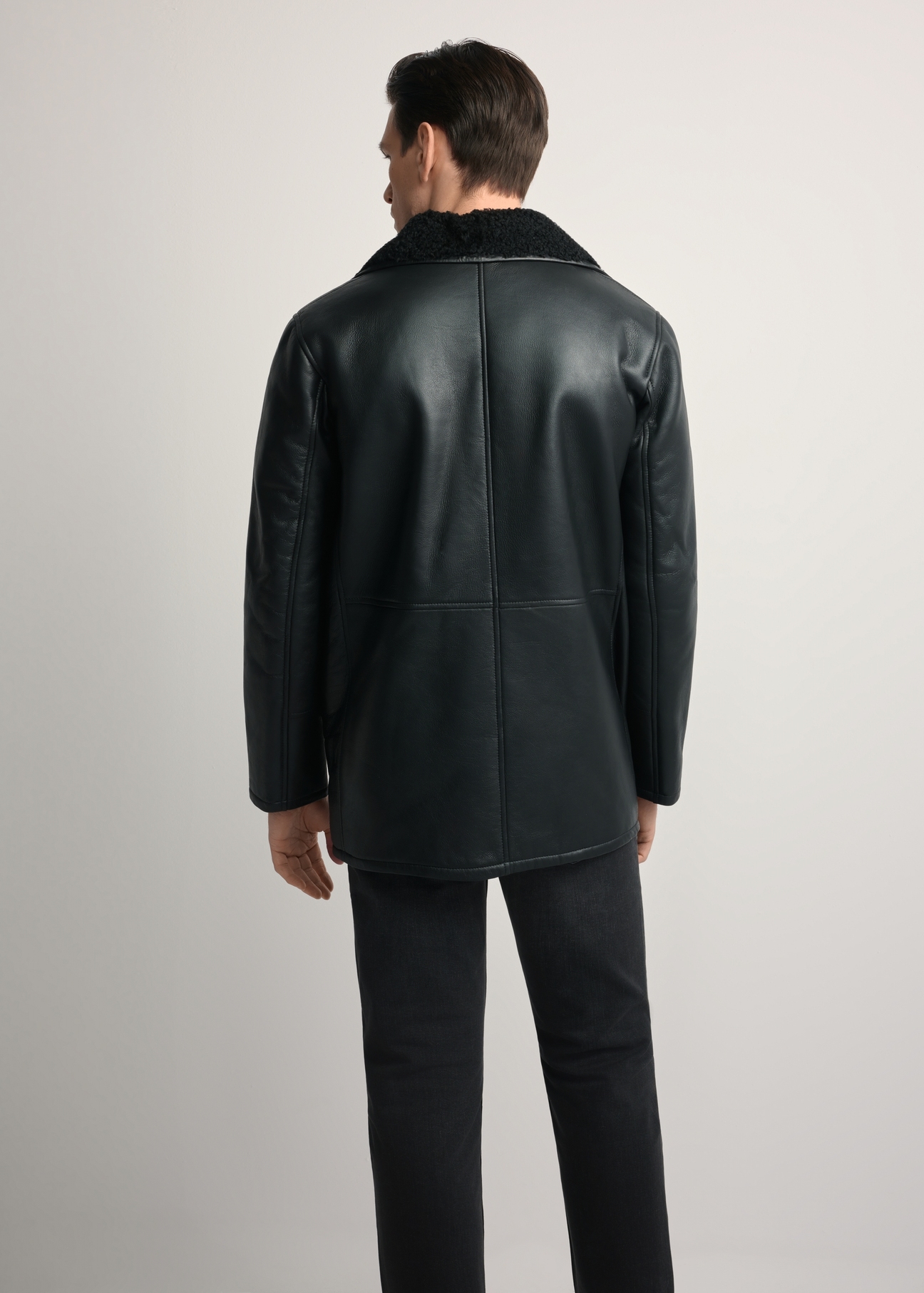 Men's long leather sheepskin coat KOZMS-0024-3189(Z25), product view from the back on the model. Half of the silhouette visible.