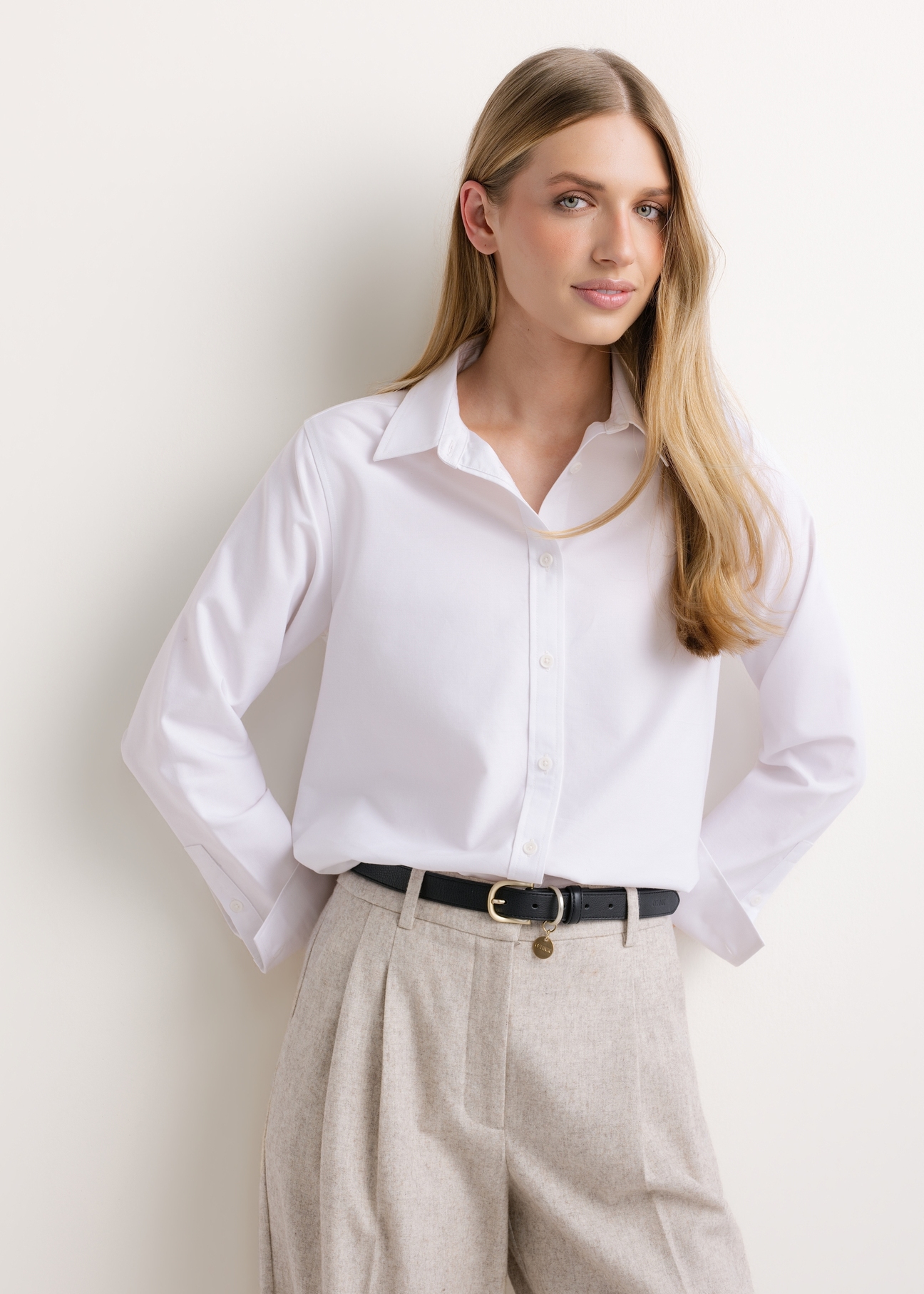 Women's long-sleeved white shirt KOSDT-0196-0A(Z26), front view on a model. Half-body shot.