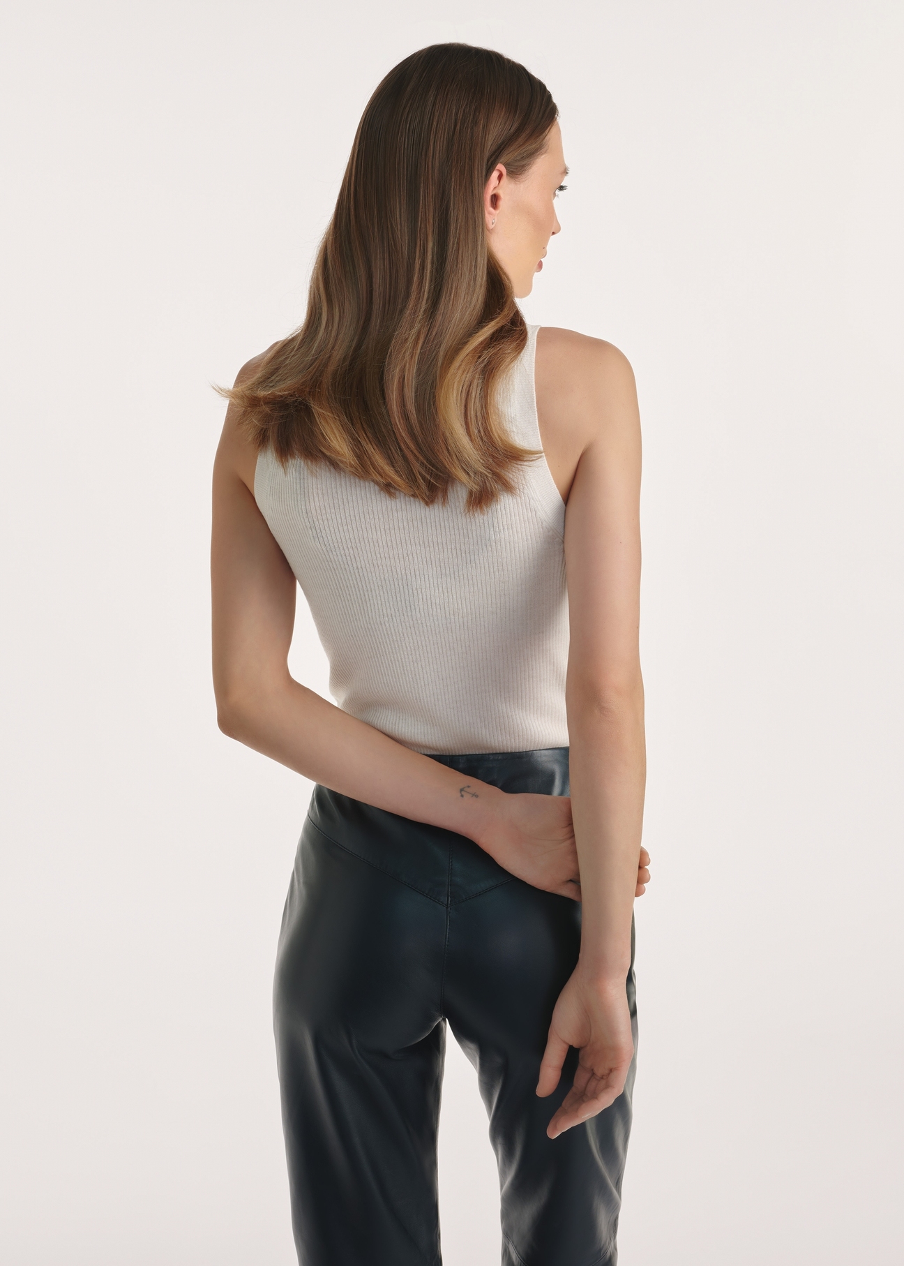 Cream women's blouse BLUDT-0197-12(Z25), product photo from the back on the model, half of the silhouette visible.02