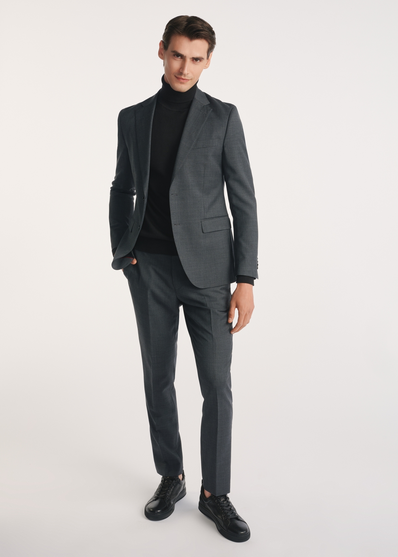 Men's trousers in graphite colour SPOMT-0112-95(Z25), product visible from the front on the model, the entire silhouette is visible.