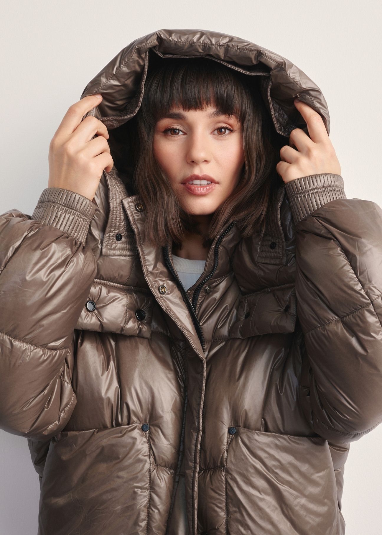 Women's short brown jacket KURDT-0608-82(Z25), product view with hood on a model against a light background.