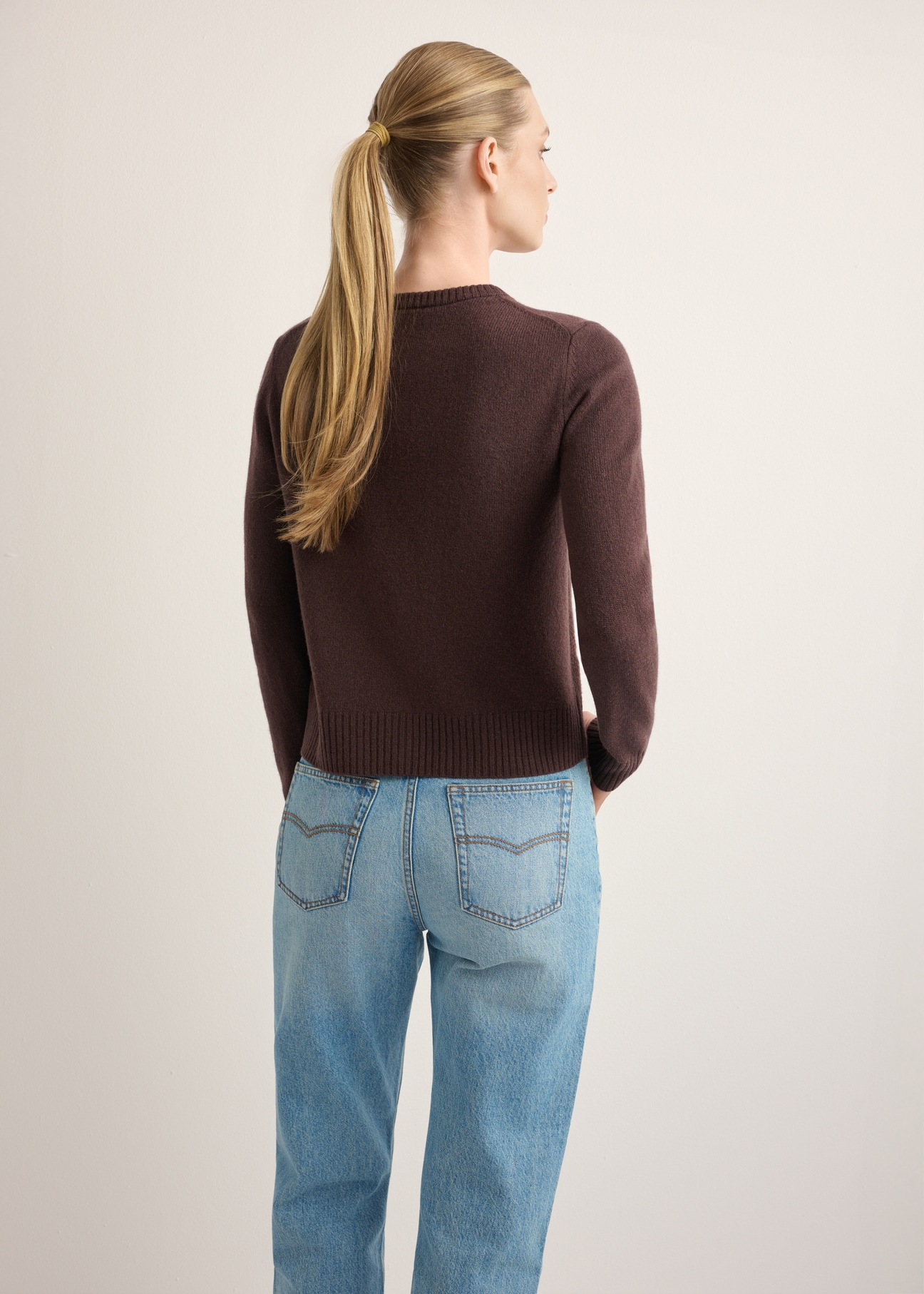 Brown women's wool cardigan KARDT-0058-1I(Z26), back view of the product on the model's silhouette. Half of the silhouette visible.
