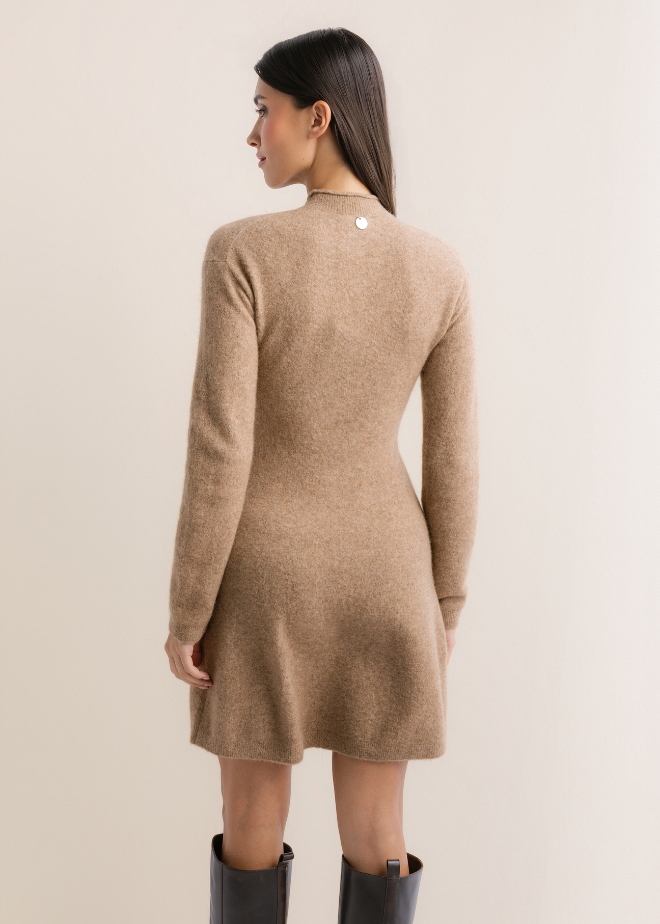 Light beige women's mini dress SUKDT-0296-1J(Z26), product view from the back on the model. Half of the silhouette visible.